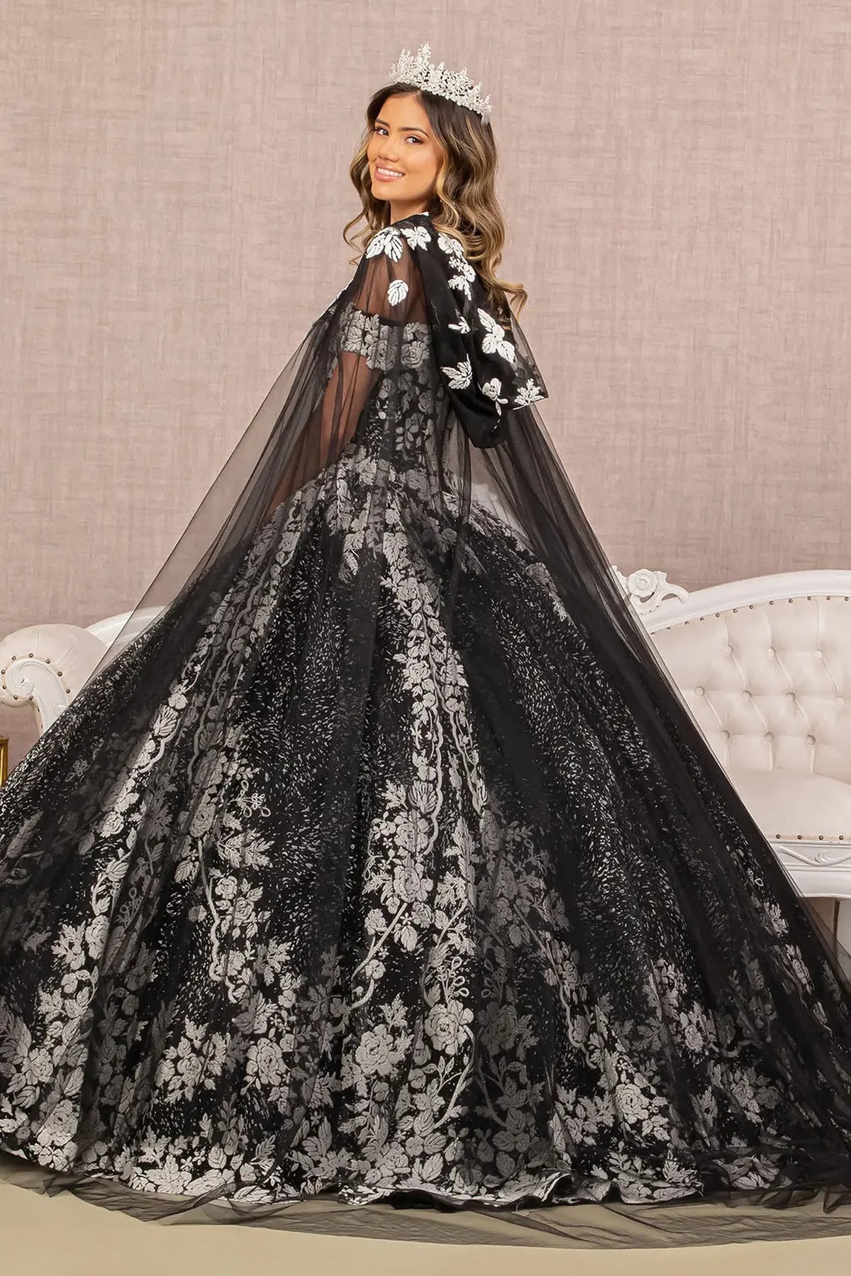 Bodice close-up highlights the Black/White quinceañera ball gown with floral glitter pattern.
