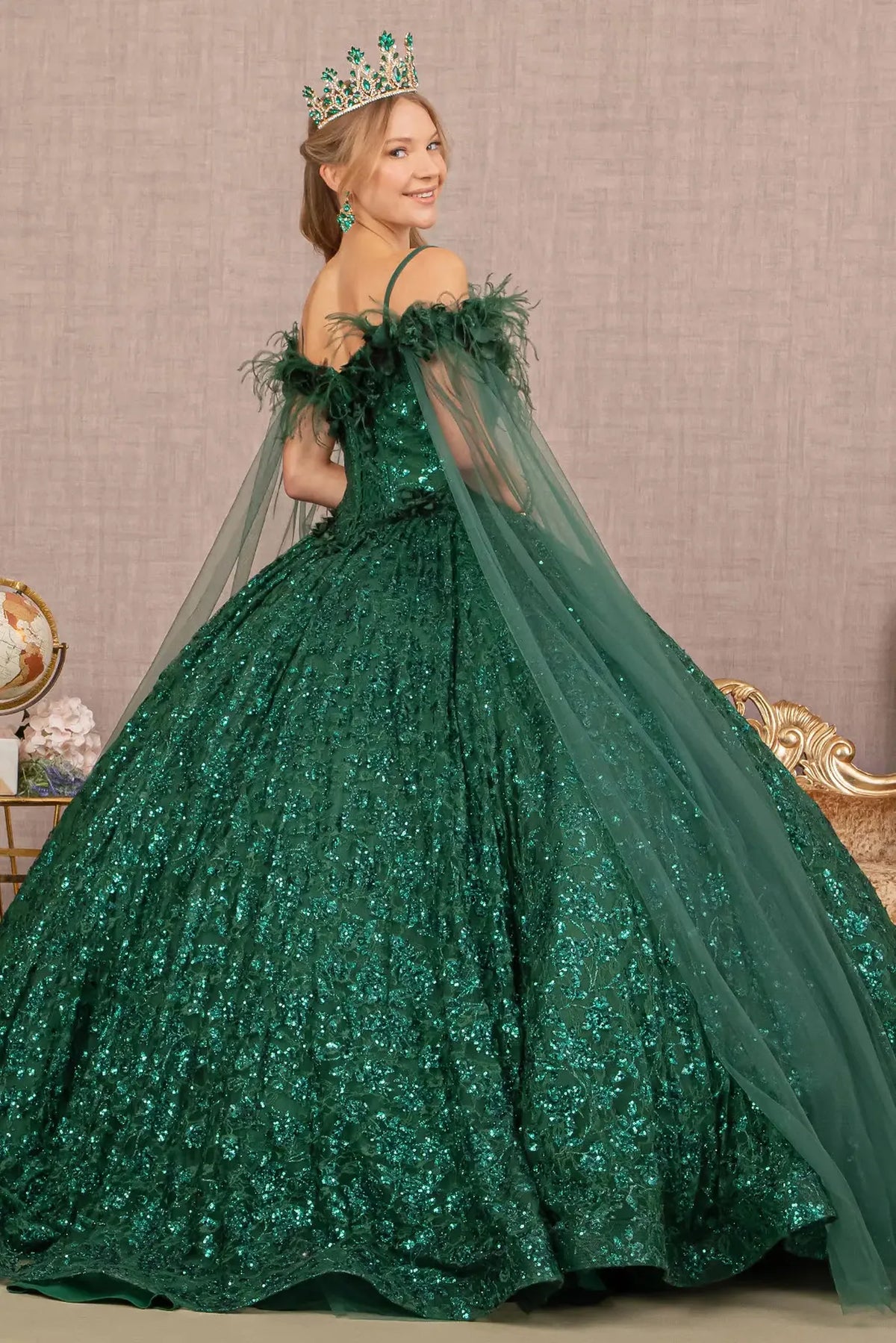 Bodice close-up highlights the Green quinceañera ball gown with detachable mesh drape.
