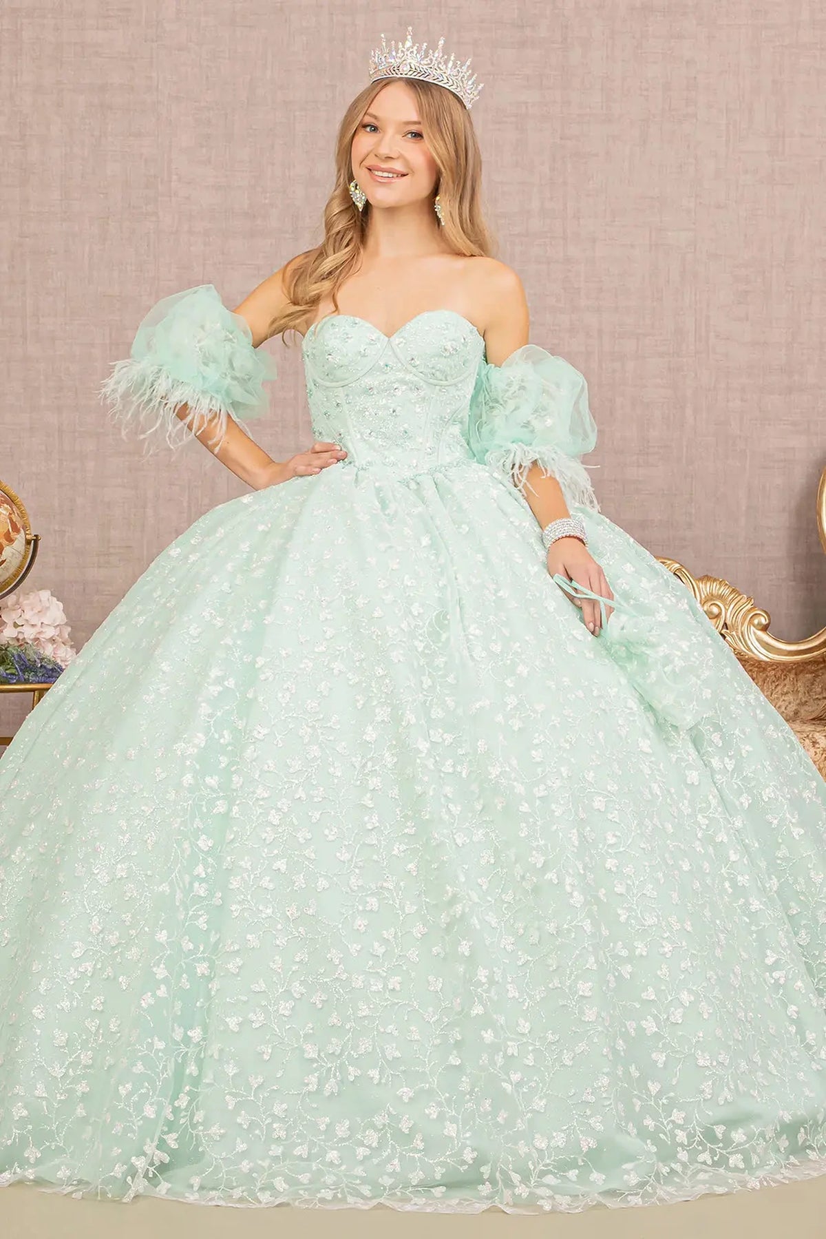 Lace-up back reveals the Mint quinceañera ball gown with lace-up back and matching mini bag.