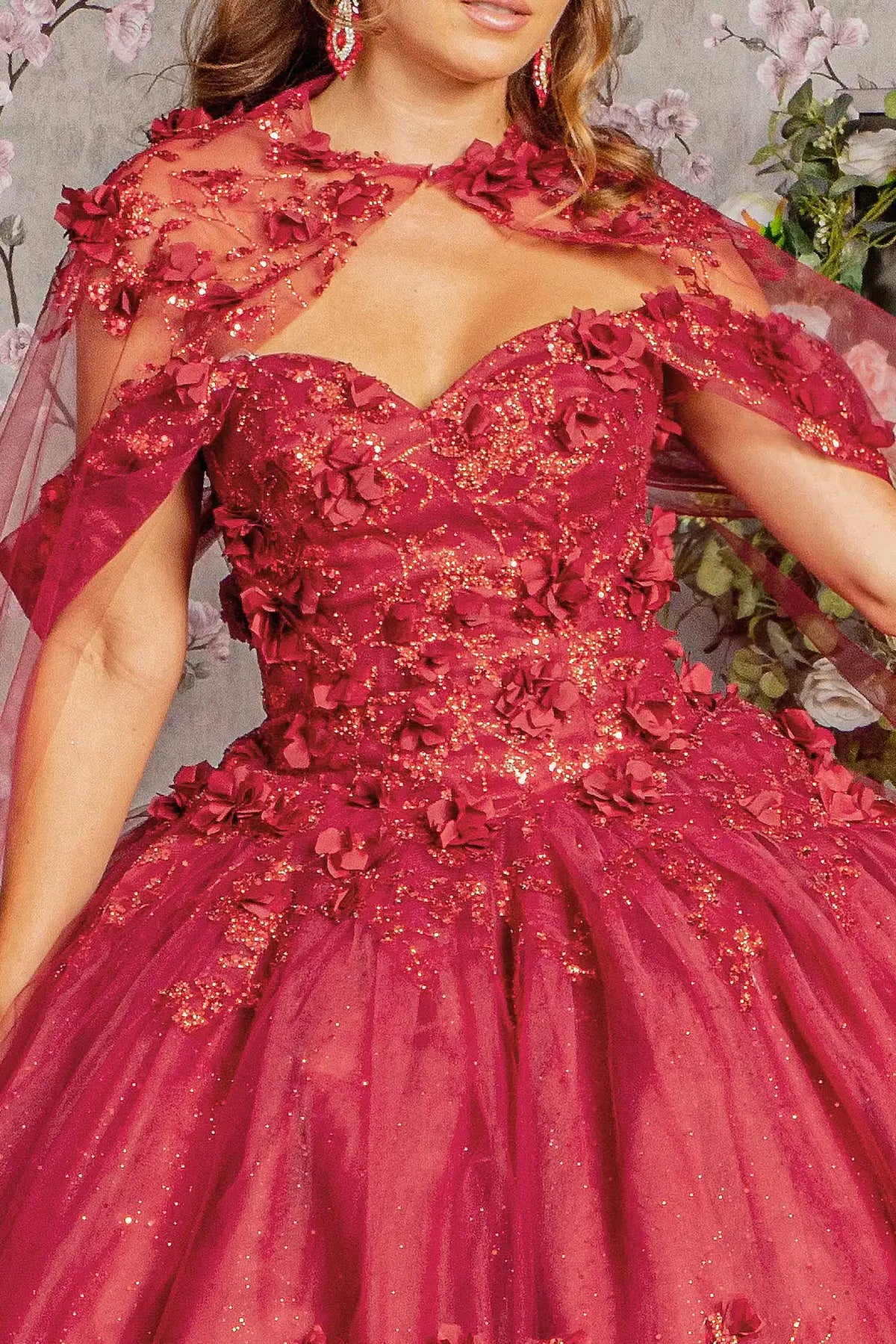 Lace-up back reveals the Burgundy quinceañera ball gown with lace-up back and 3d floral appliqués.