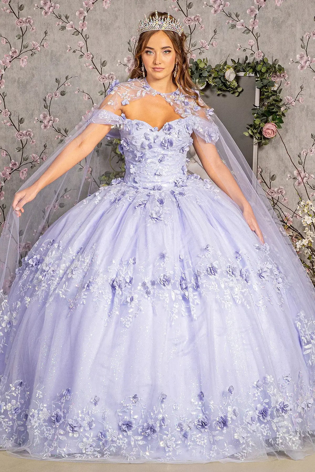 Full-length view presents the Lilac quinceañera ball gown with long mesh cape.