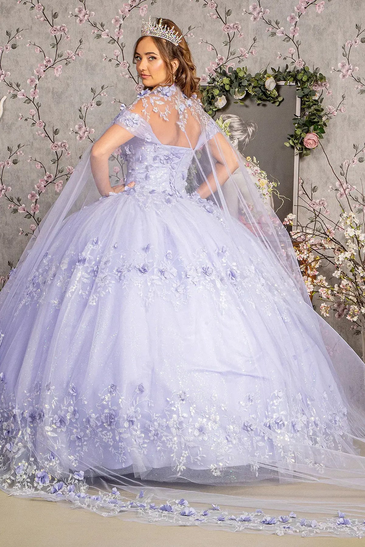 Lace-up back reveals the Lilac quinceañera ball gown with lace-up back and 3d floral appliqués.