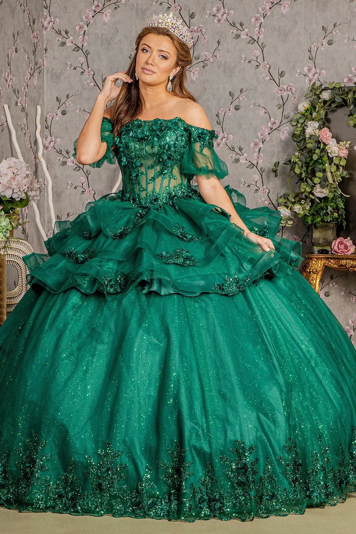 Full-length view presents the Hunter Green quinceañera ball gown with ruffled skirt.