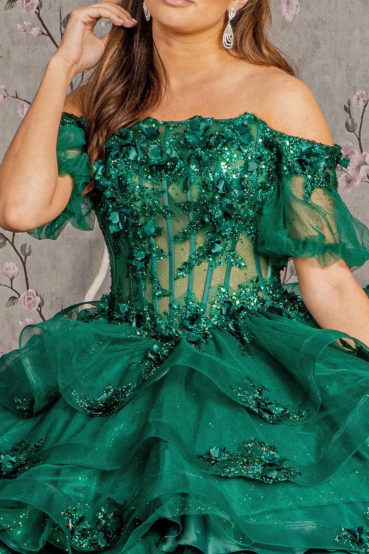 Lace-up back reveals the Hunter Green quinceañera ball gown with lace-up back and 3d floral appliqués.