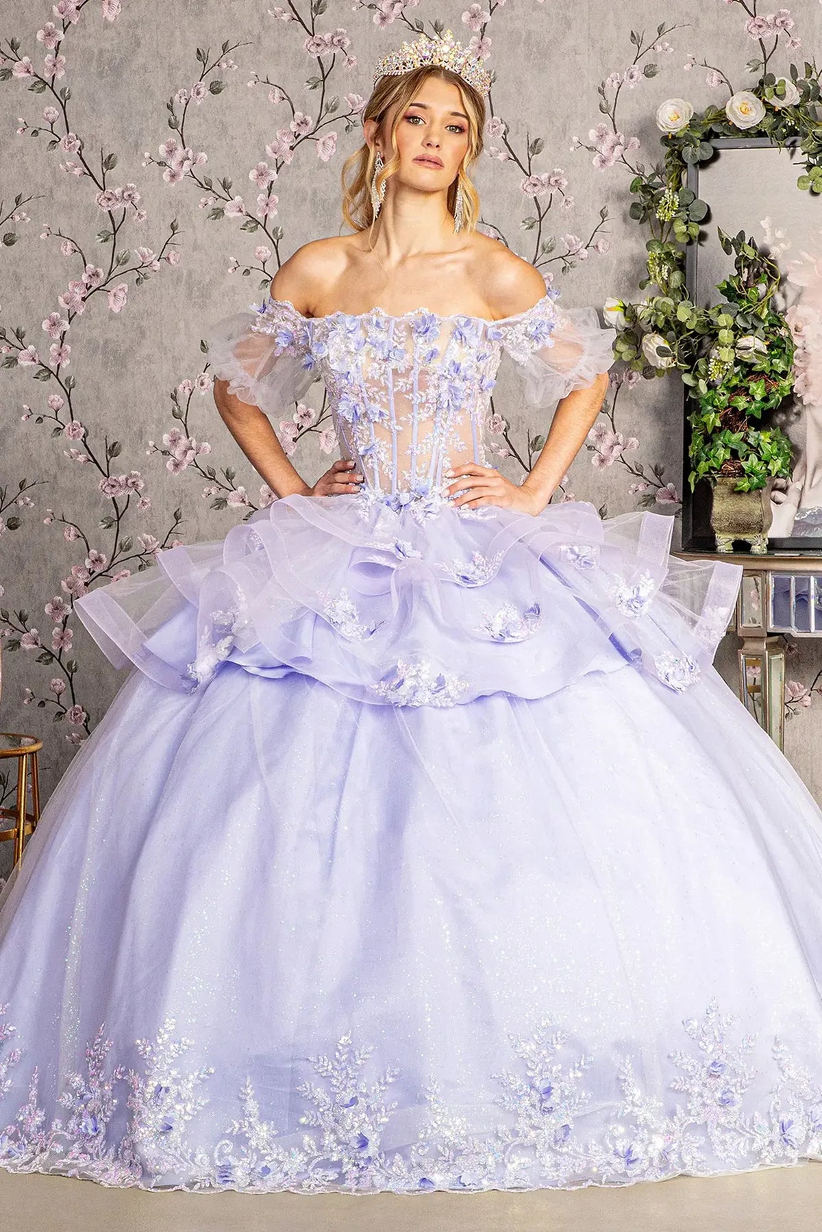 Full-length view presents the Lilac quinceañera ball gown with ruffled skirt.