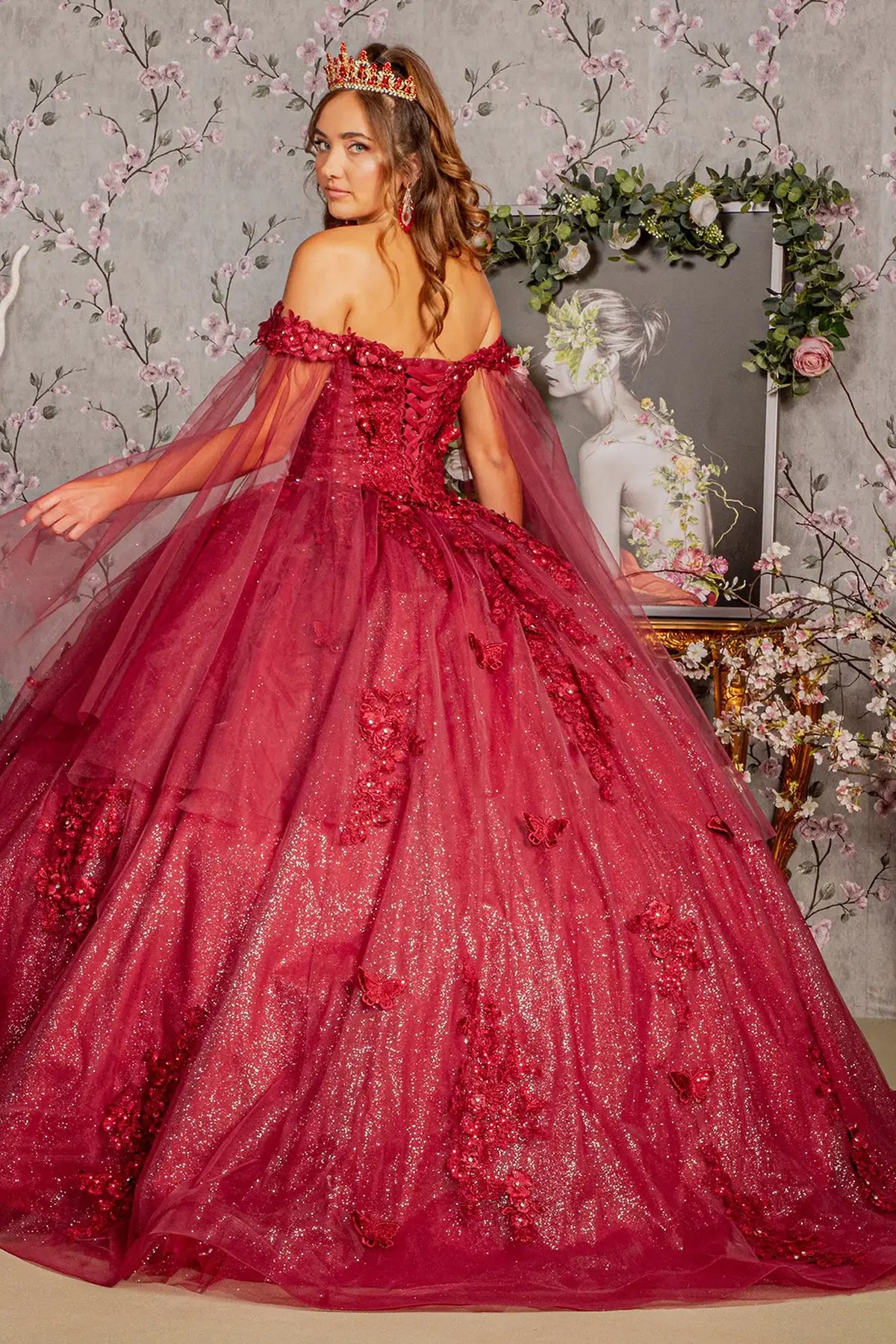 Bodice close-up highlights the Burgundy quinceañera ball gown with jeweled glitter mesh.