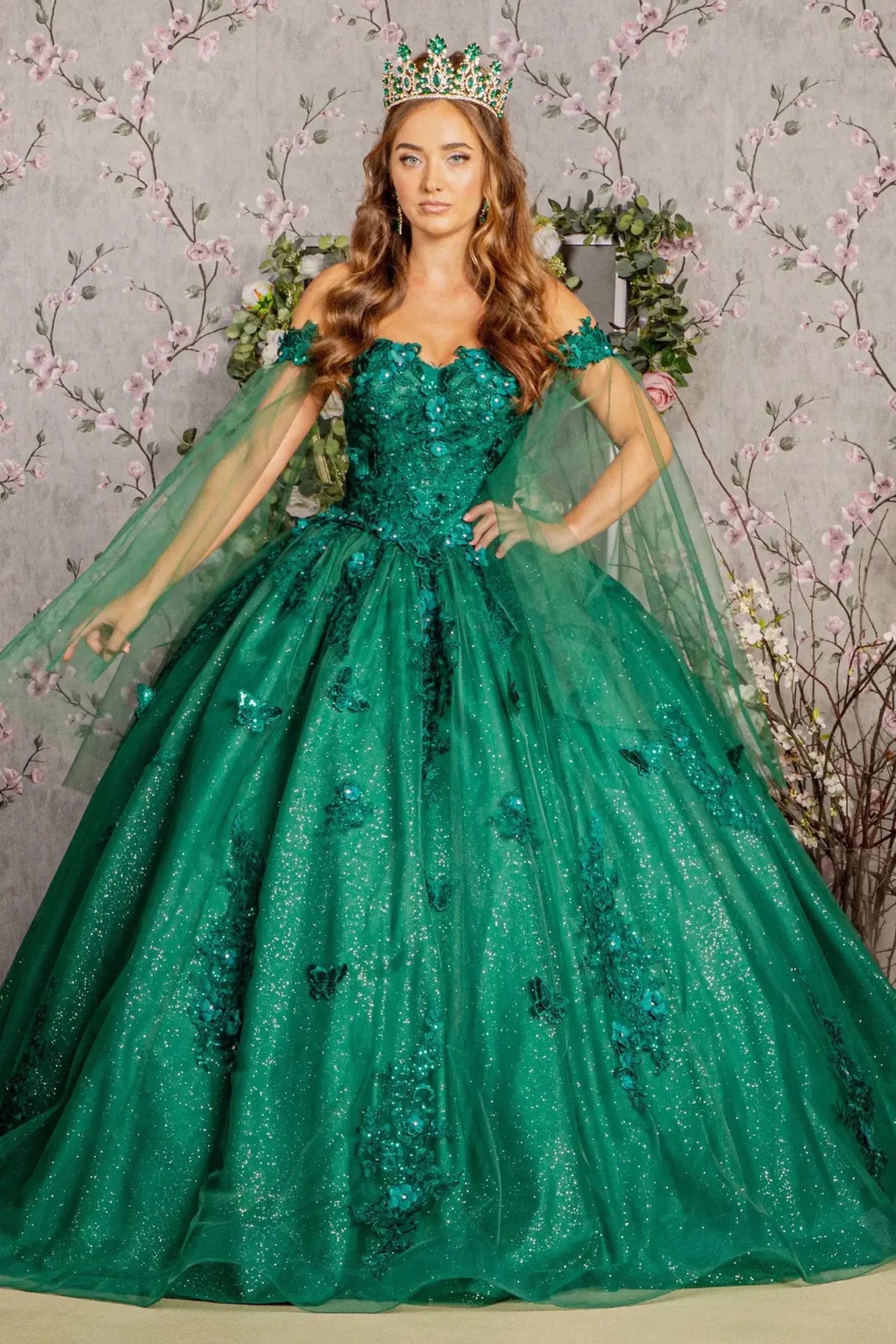 Full-length view presents the Hunter Green quinceañera ball gown with detachable mesh drapes.