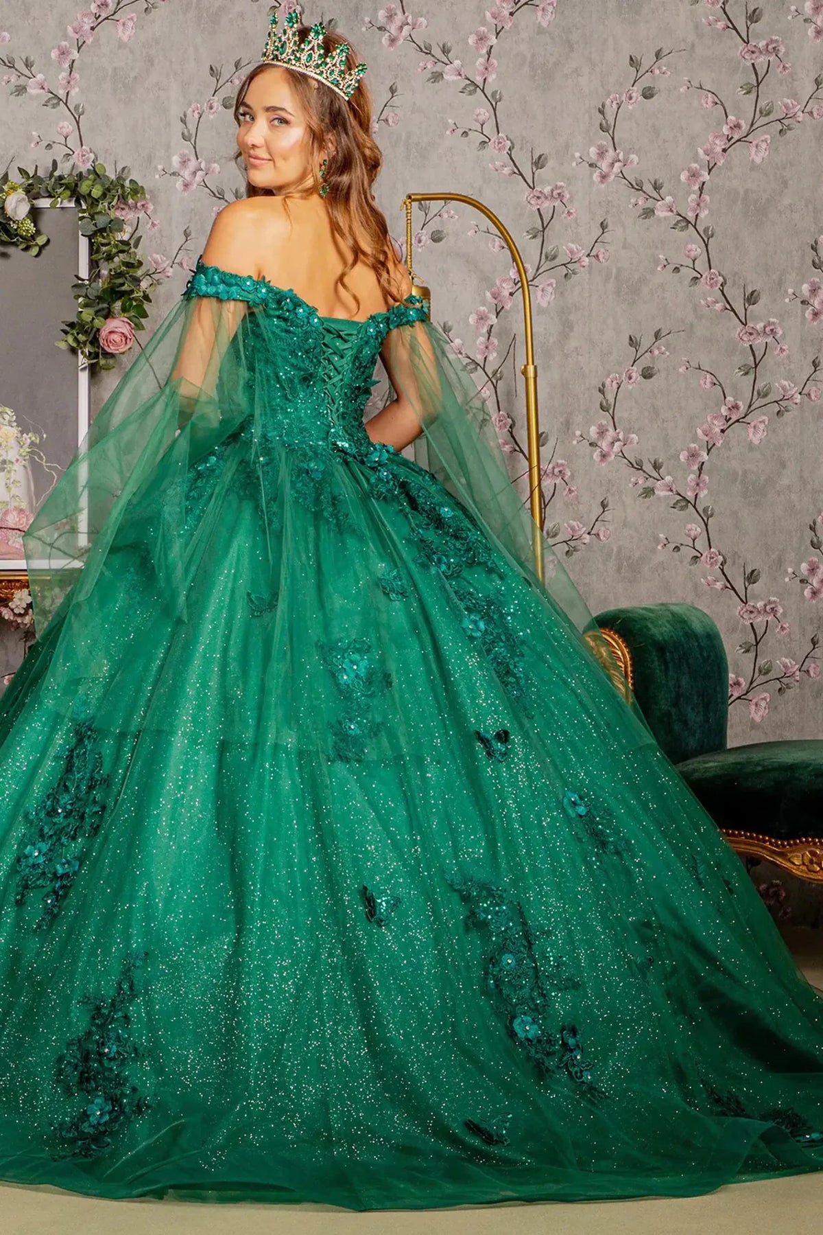 Bodice close-up highlights the Hunter Green quinceañera ball gown with jeweled glitter mesh.