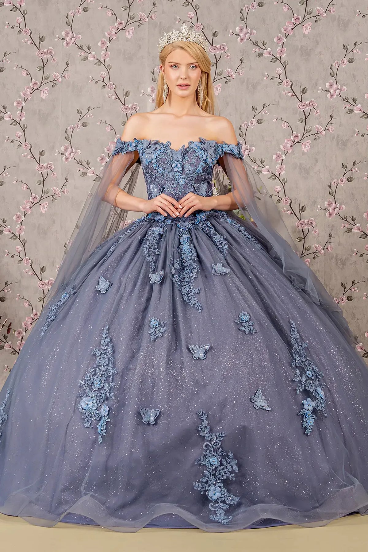 Lace-up back reveals the Smoky Blue quinceañera ball gown with lace-up back and jeweled glitter mesh.