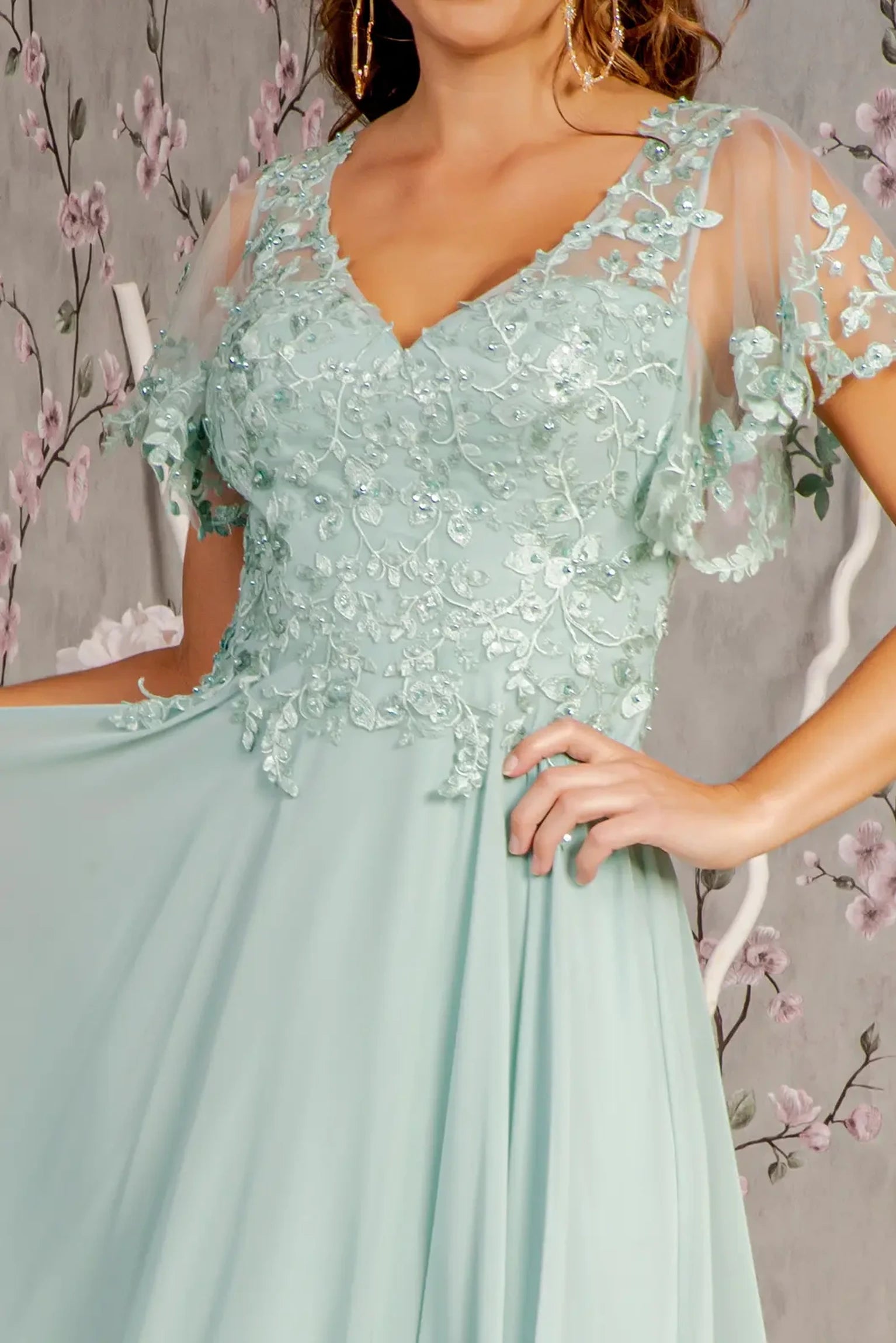 Sage mother of the bride dress featuring sweetheart bodice with short sleeve and applique, beads, embroidery, sequin