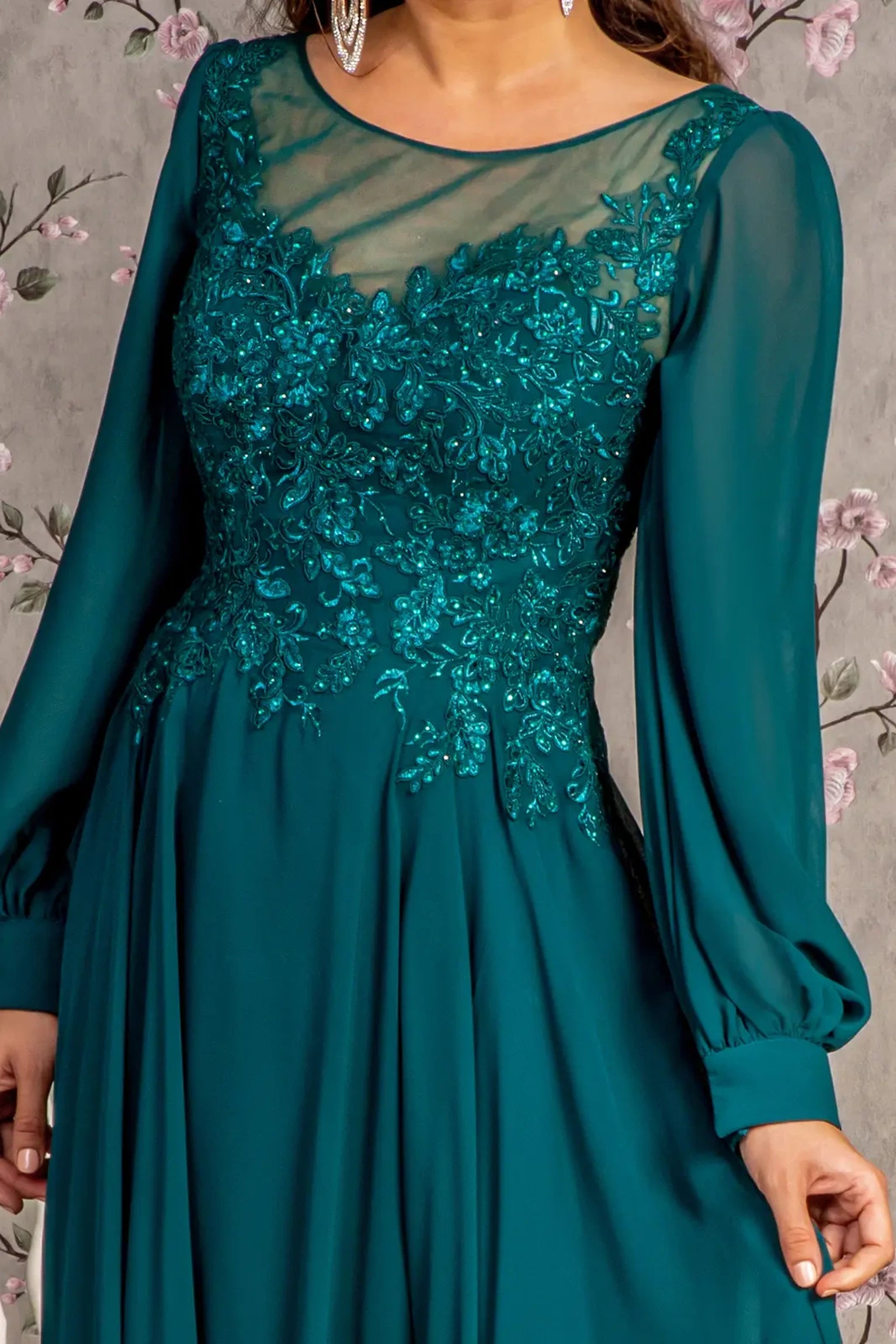 Teal mother of the bride dress featuring boat-neck bodice with long sleeve and beads, embroidery