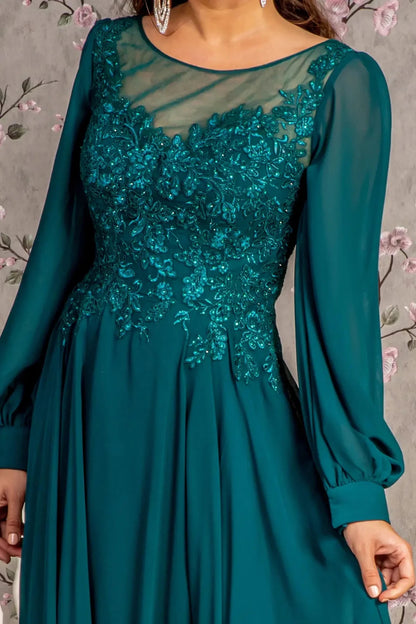 Bodice close-up highlights teal mother of the bride dress featuring boat-neck bodice with long sleeve and beads, embroidery.
