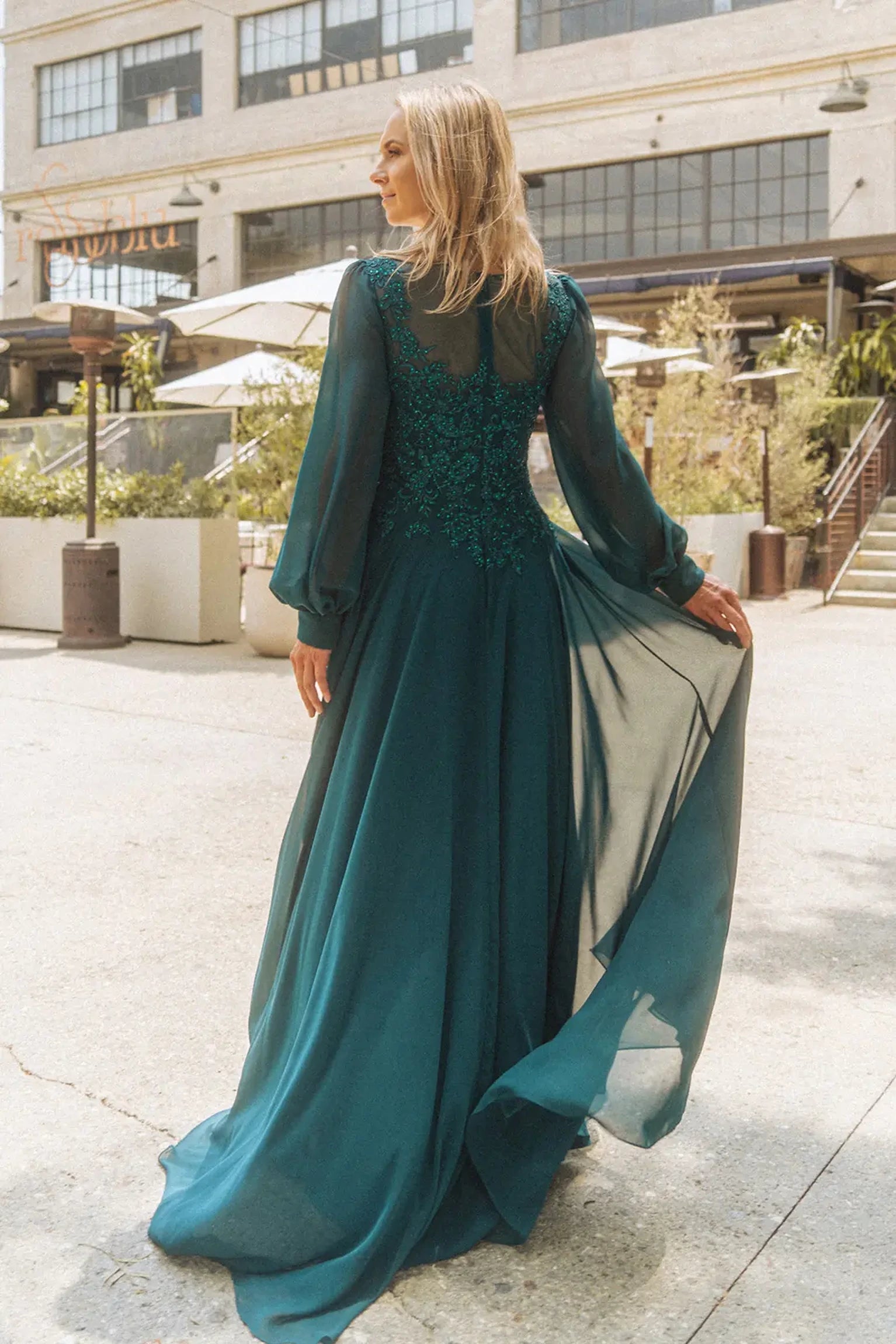 Teal a-line mother of the bride dress with concealed zipper back and long sleeve
