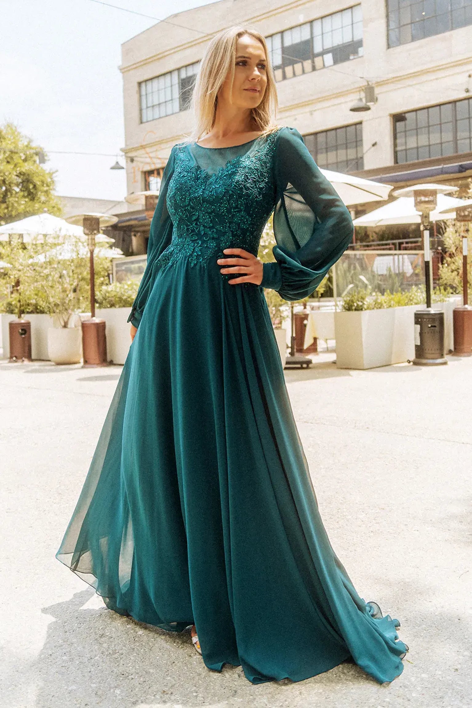 Teal mother of the bride dress featuring chiffon skirt with a-line shaping and beads, embroidery