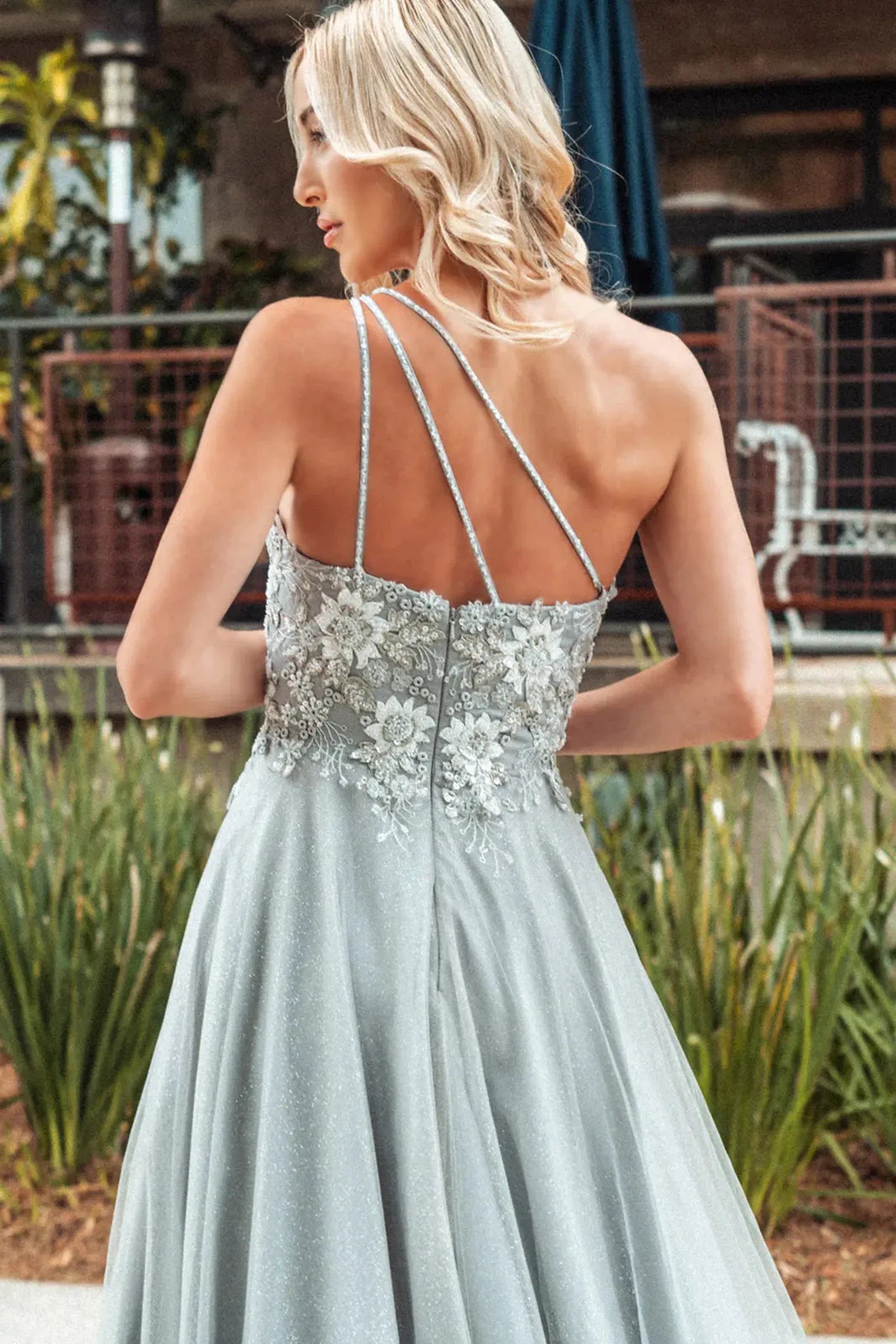Silver mother of the bride dress featuring formal gown with asymmetric, one shoulder, and mesh skirt
