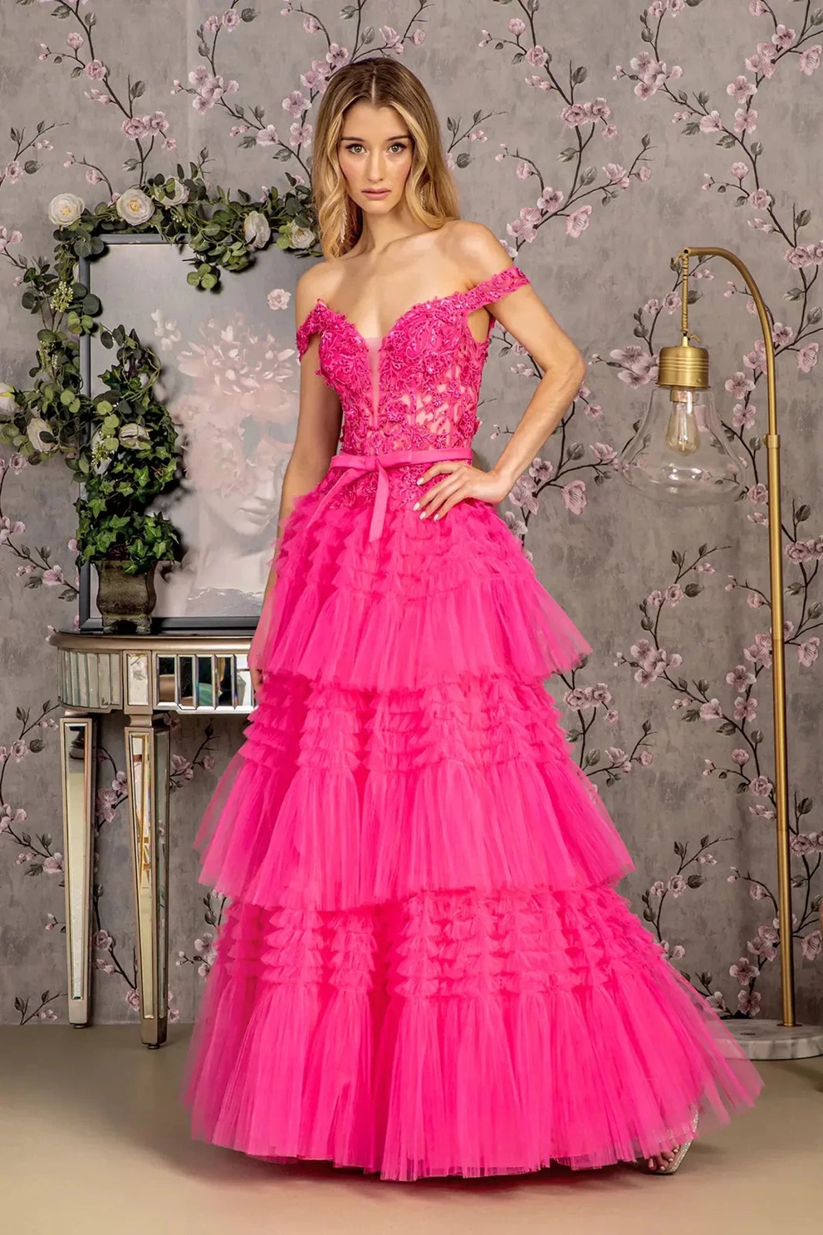 Full-length front view shows appliqué off-shoulder styling on the Fuchsia prom evening dress.