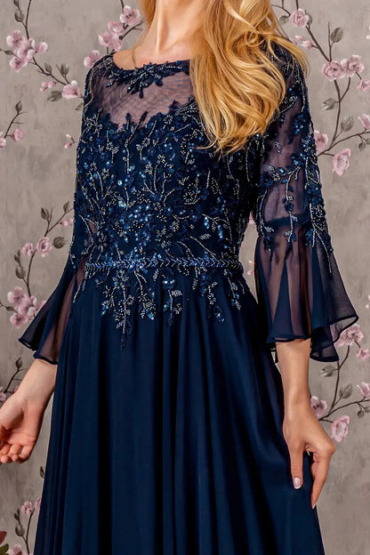 Bodice close-up highlights navy mother of the bride dress featuring boat-neck bodice with 3/4 sleeve and beads, embroidery, sequin.