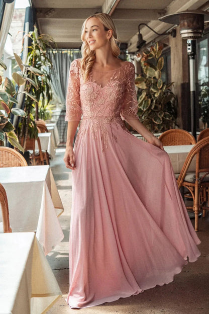 Back detail shows dusty Rose mother of the bride dress featuring v-back with concealed zipper bodice finished with beads, embroidery.