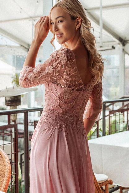 Detailed view highlights dusty Rose mother of the bride dress featuring chiffon skirt with a-line shaping and beads, embroidery.
