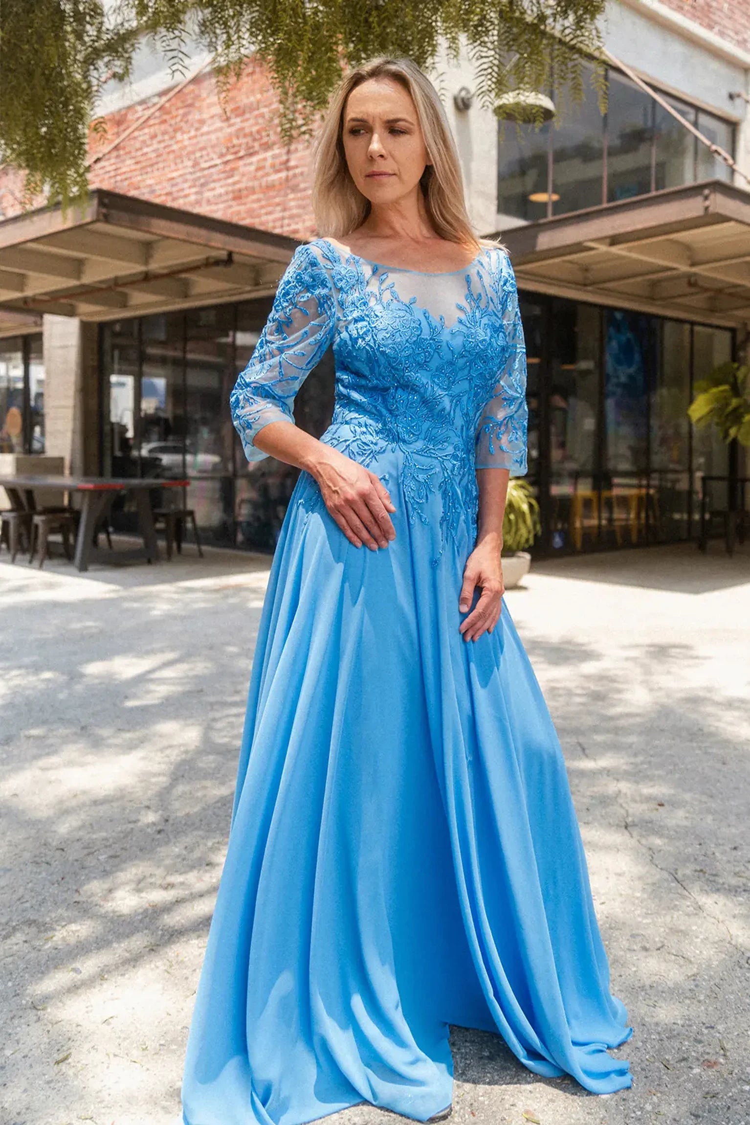 Perry Blue mother of the bride dress featuring chiffon skirt with a-line shaping and beads, embroidery