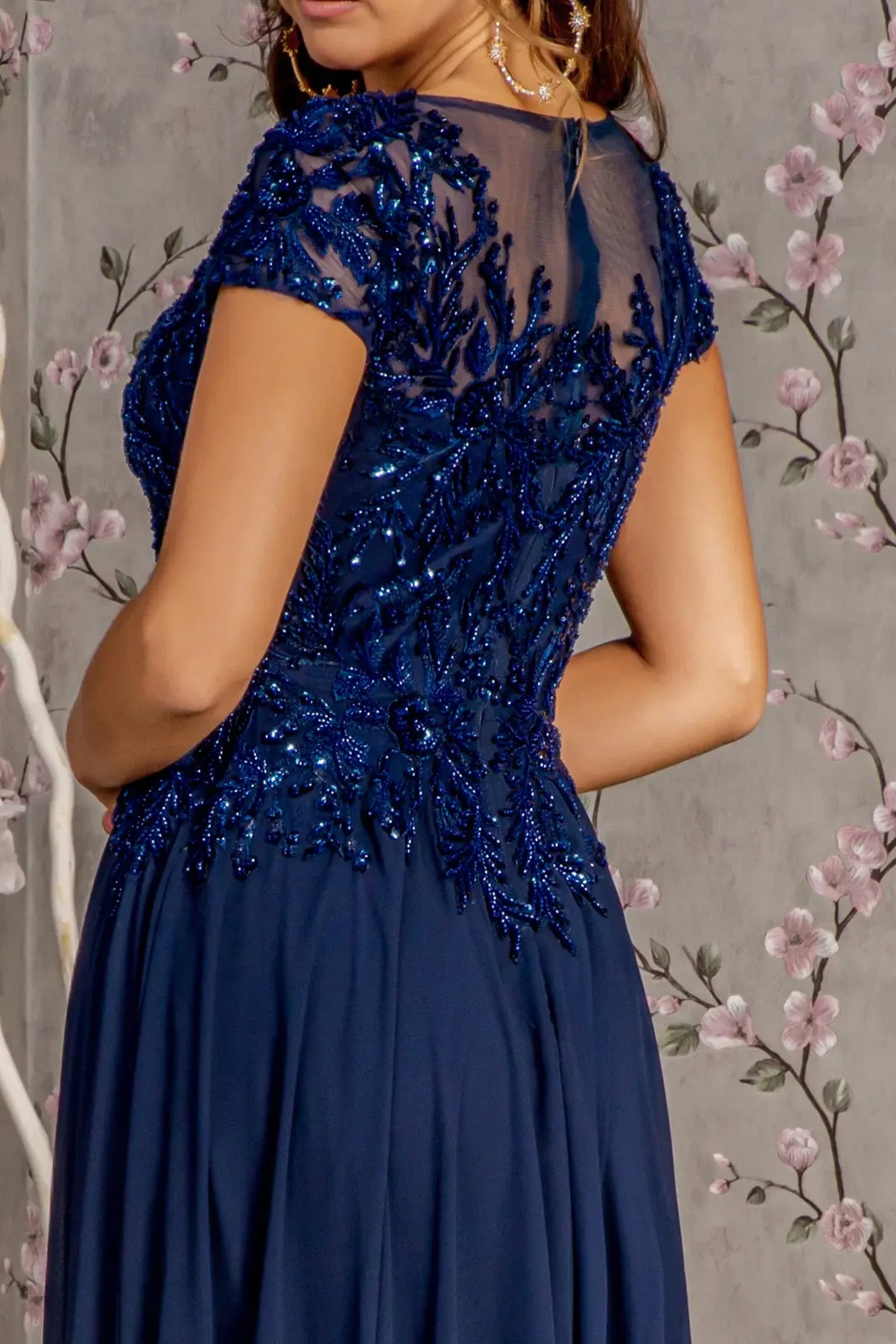 Navy mother of the bride dress featuring concealed zipper back bodice finished with beads, embroidery, sequin
