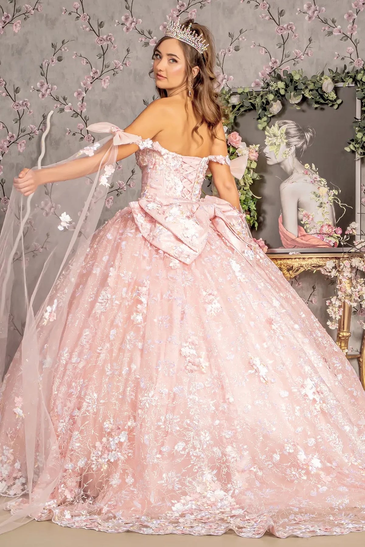 Bodice close-up highlights the Blush quinceañera ball gown with long mesh drapes.