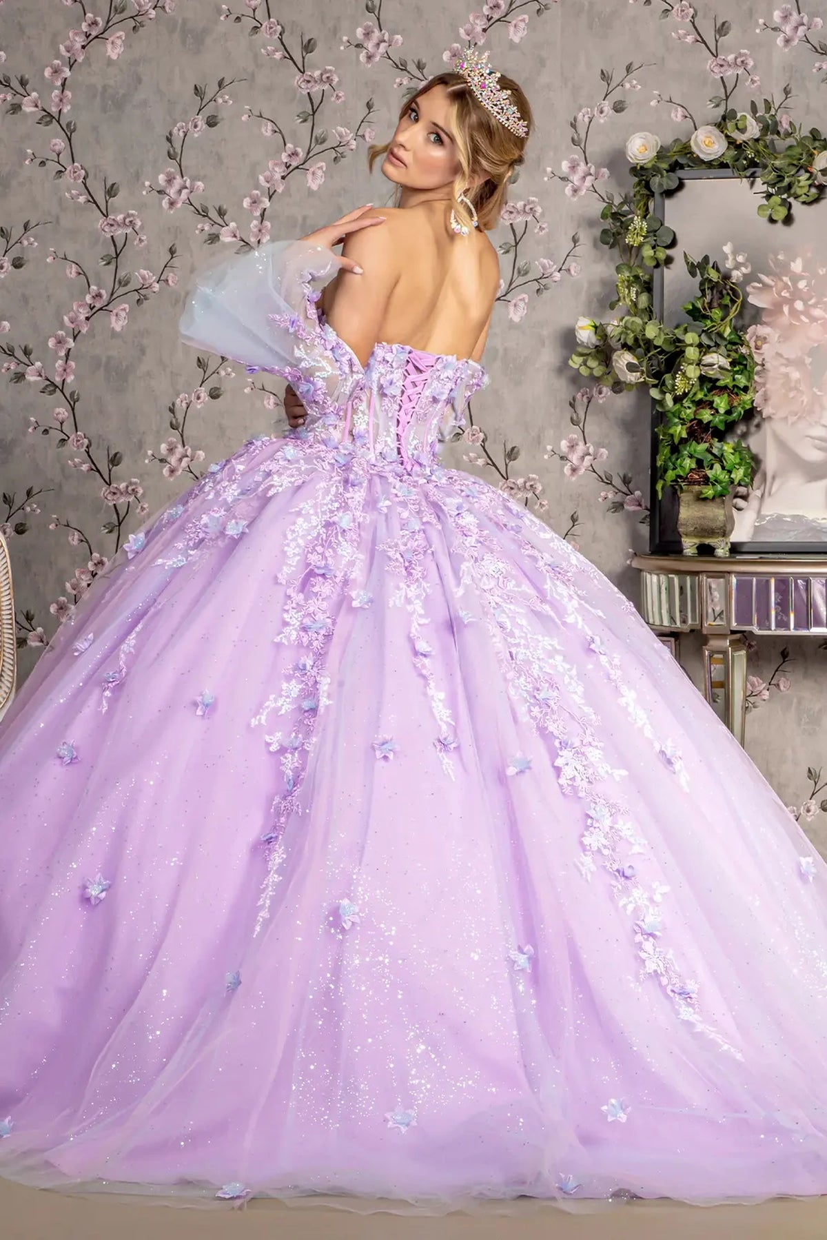 Bodice close-up highlights the Lilac quinceañera ball gown with jeweled sheer bodice.