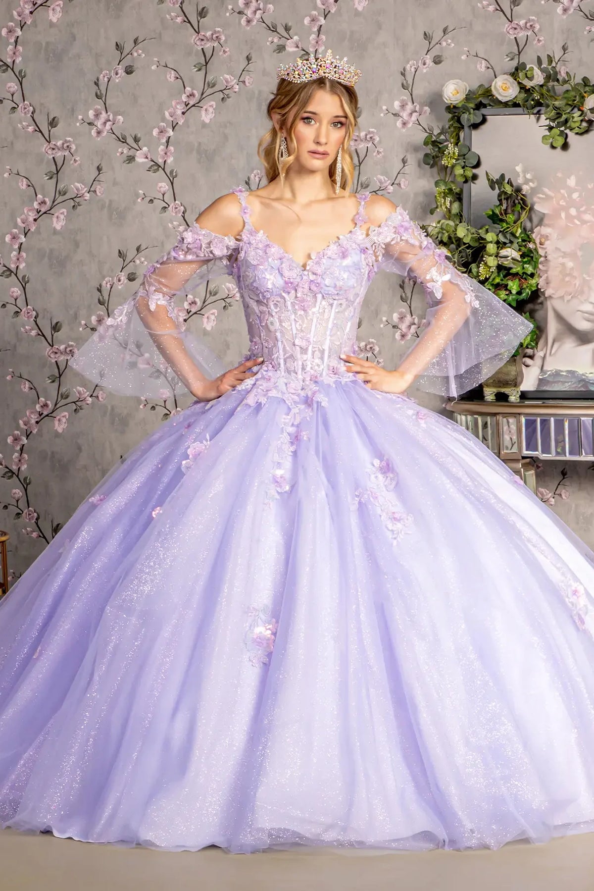 Embroidered details frame the Lilac quinceañera ball gown with long sleeves.