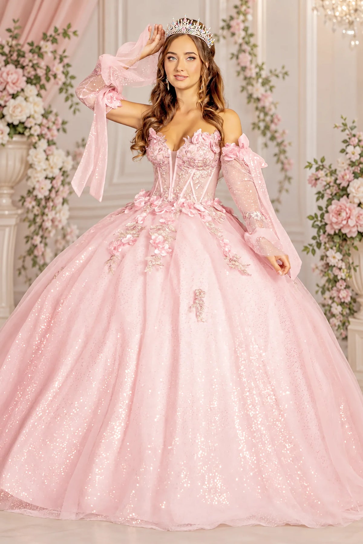 Blush quinceañera ball gown with glitter tulle skirt and 3D floral corset