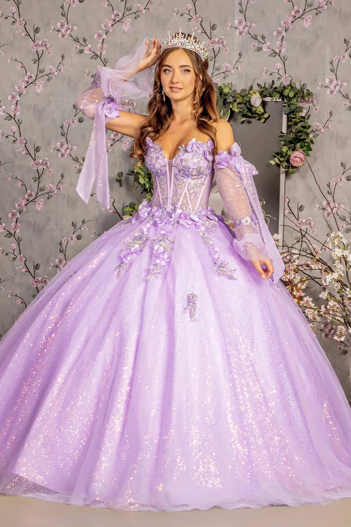 Bodice close-up highlights the Lilac quinceañera ball gown with long sleeves.