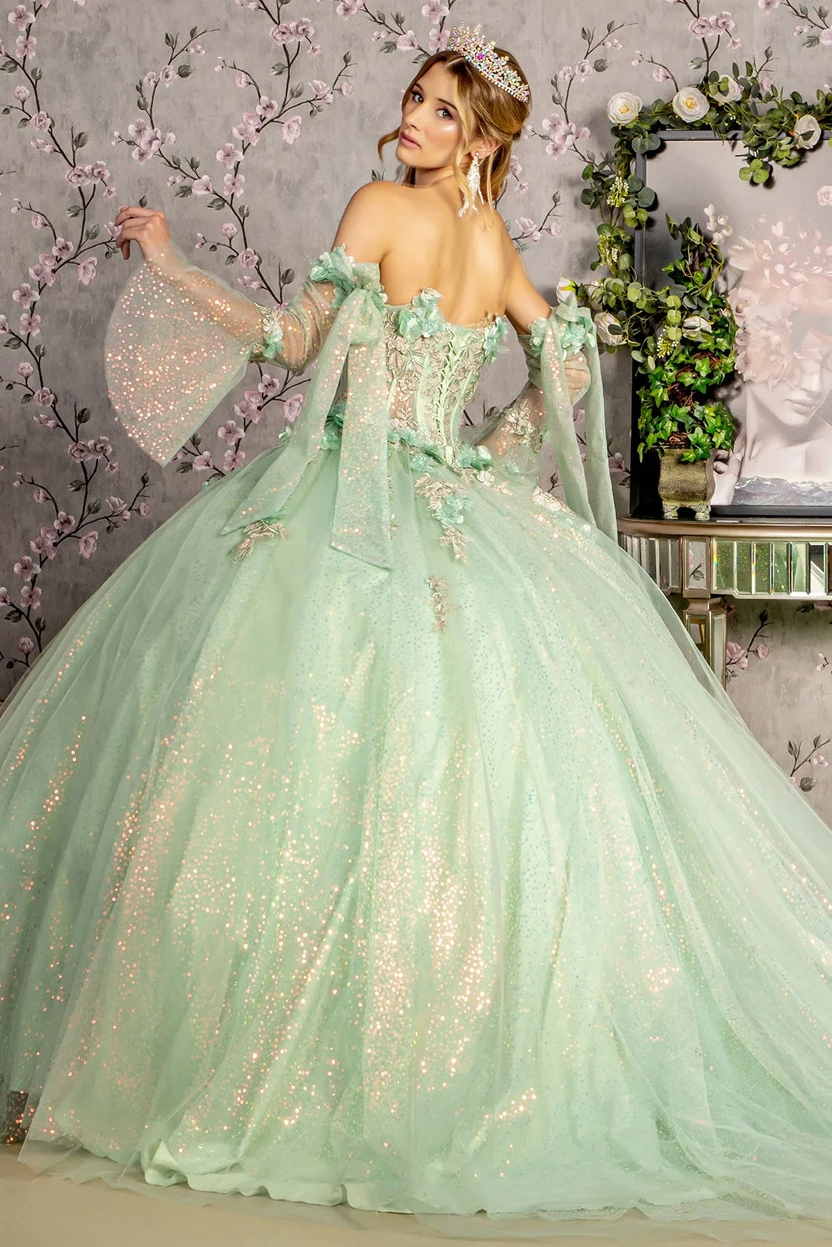 Bodice close-up highlights the Sage quinceañera ball gown with long sleeves.