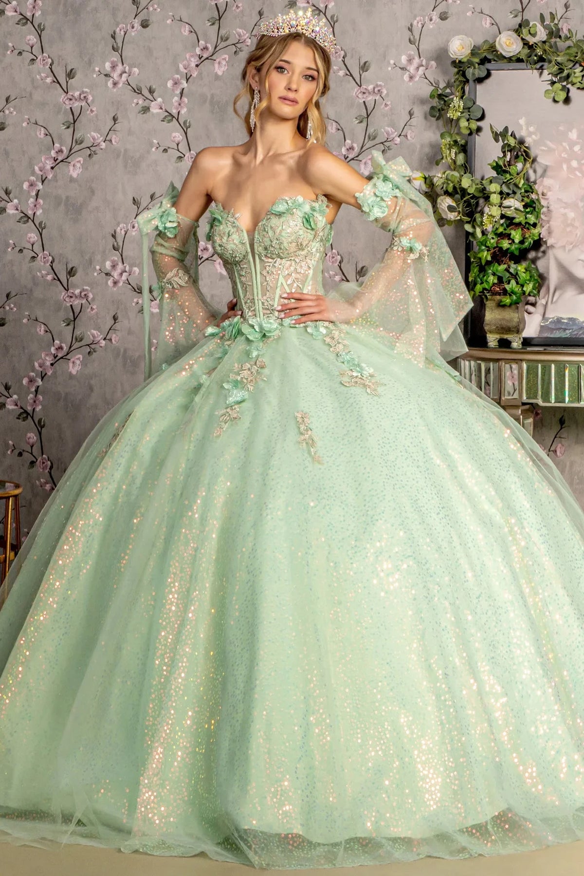 Embroidered details frame the Sage quinceañera ball gown with 3d floral embroidery.