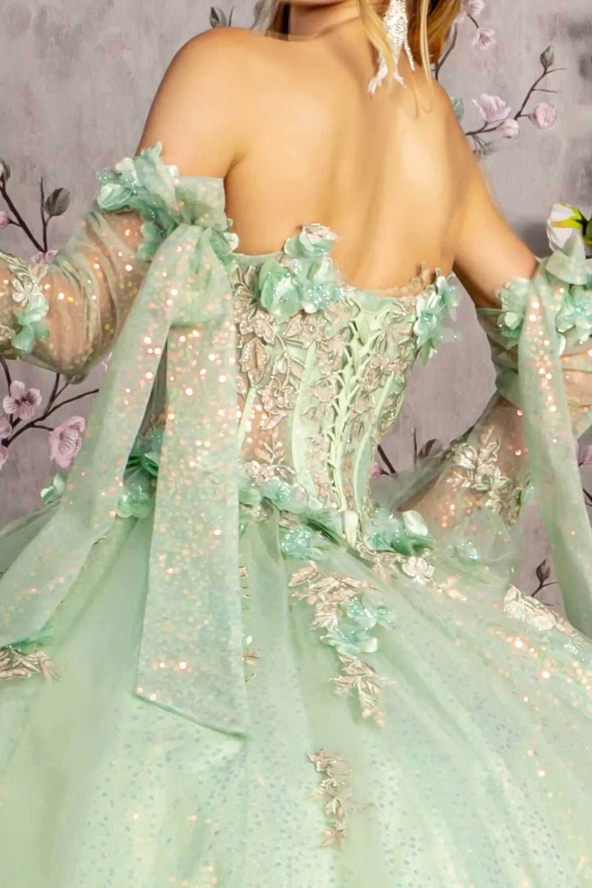 Detachable accents complete the Sage quinceañera ball gown with 3d floral embroidery.