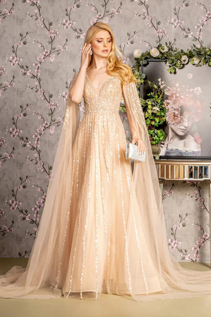 Detailed view highlights champagne mesh a-line mother of the bride dress with illusion sweetheart.