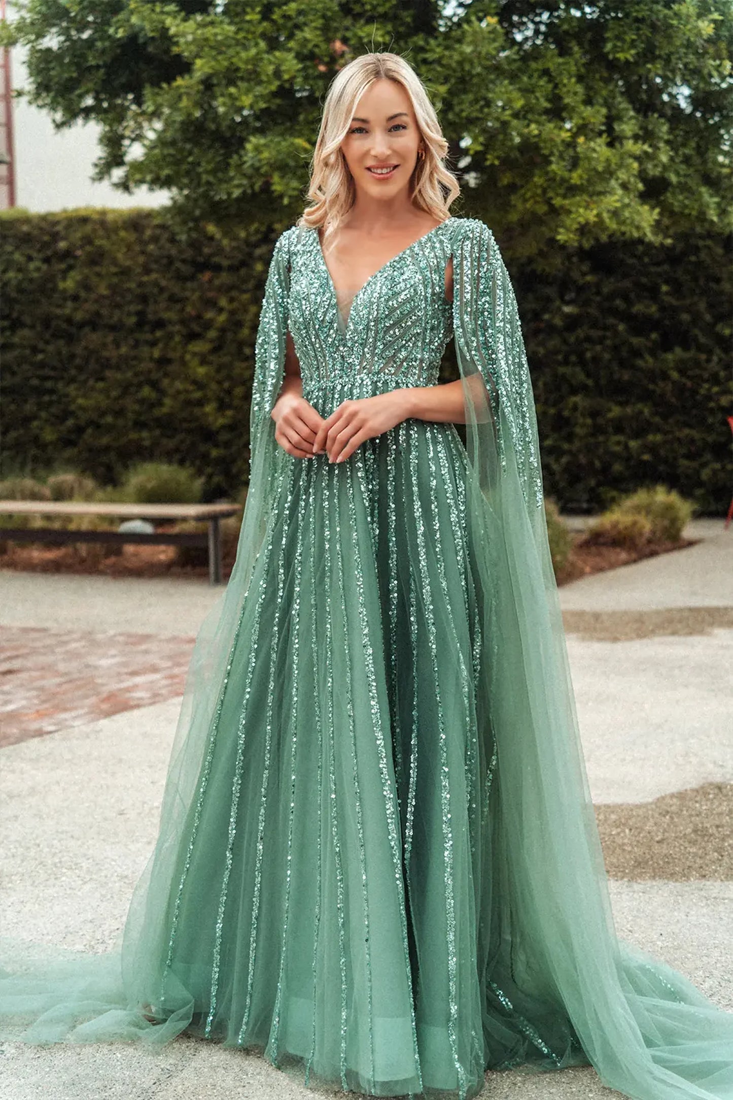 Sage a-line mother of the bride dress with v-back with concealed zipper and cape sleeve