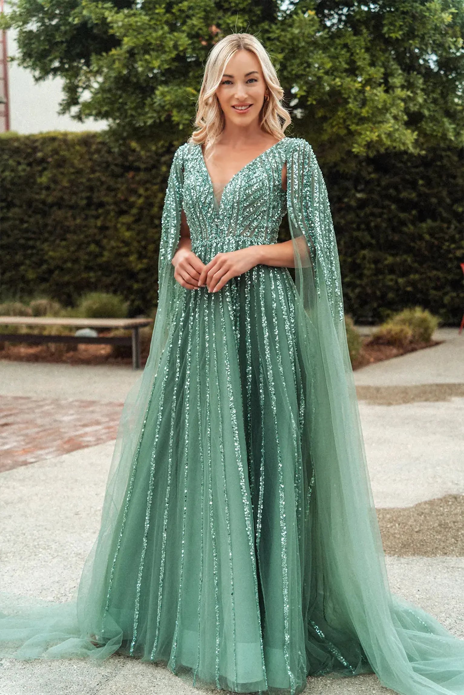 Sage a-line mother of the bride dress with v-back with concealed zipper and cape sleeve