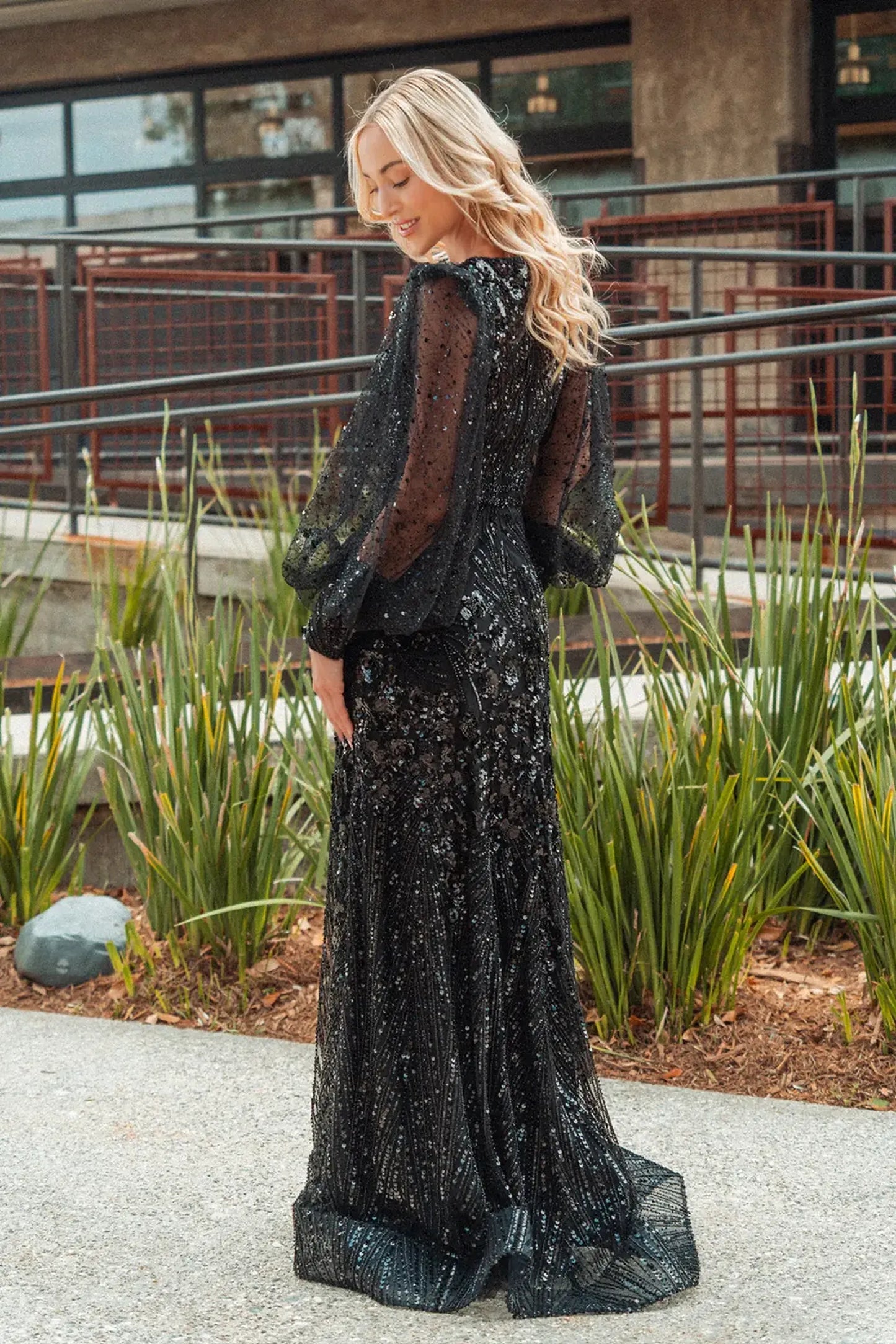 Black mother of the bride dress featuring mesh skirt with a-line shaping and beads, glitter, sequin