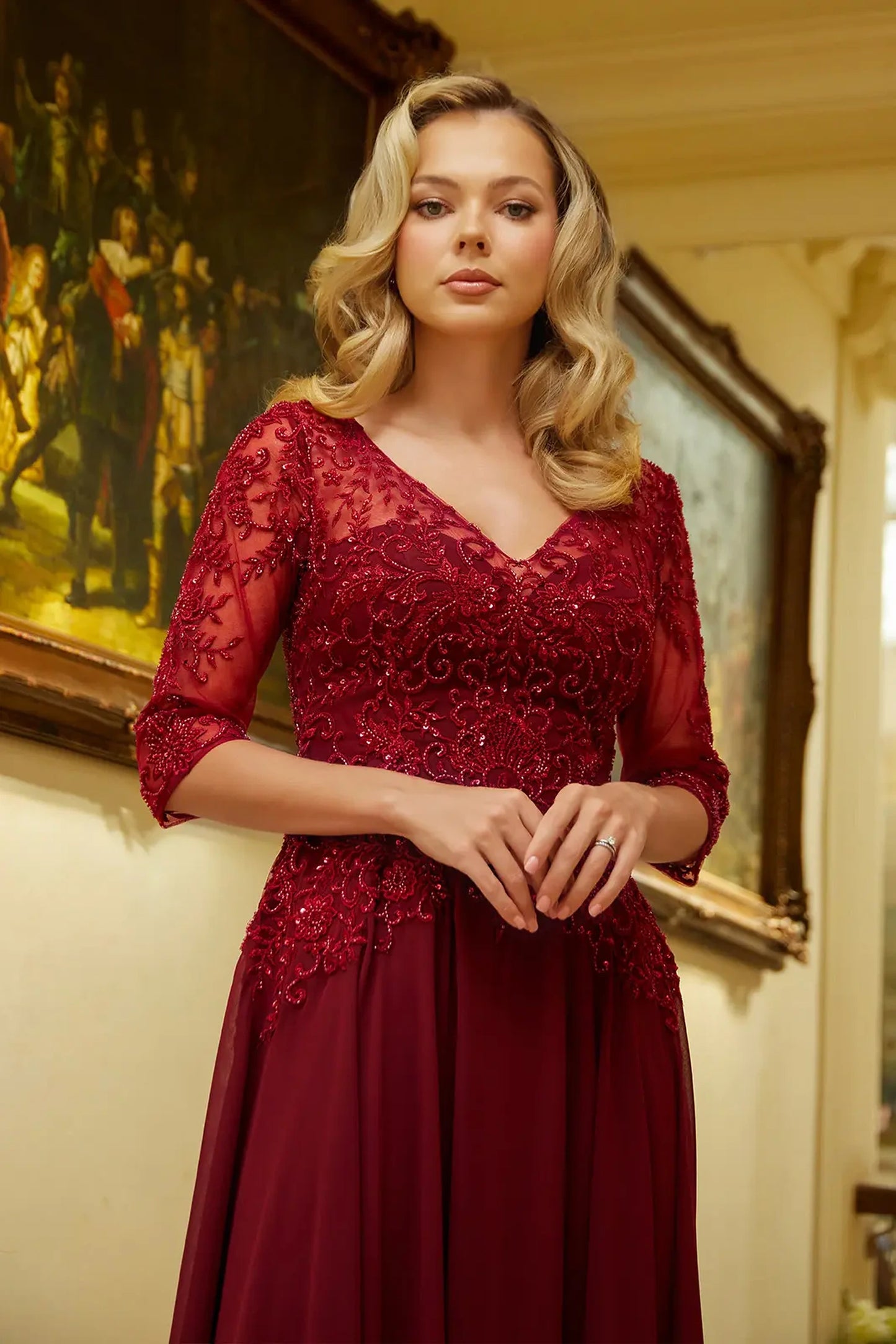 Burgundy mother of the bride dress featuring illusion v-neck bodice with 1/2 sleeve and beads, embroidery, sequin