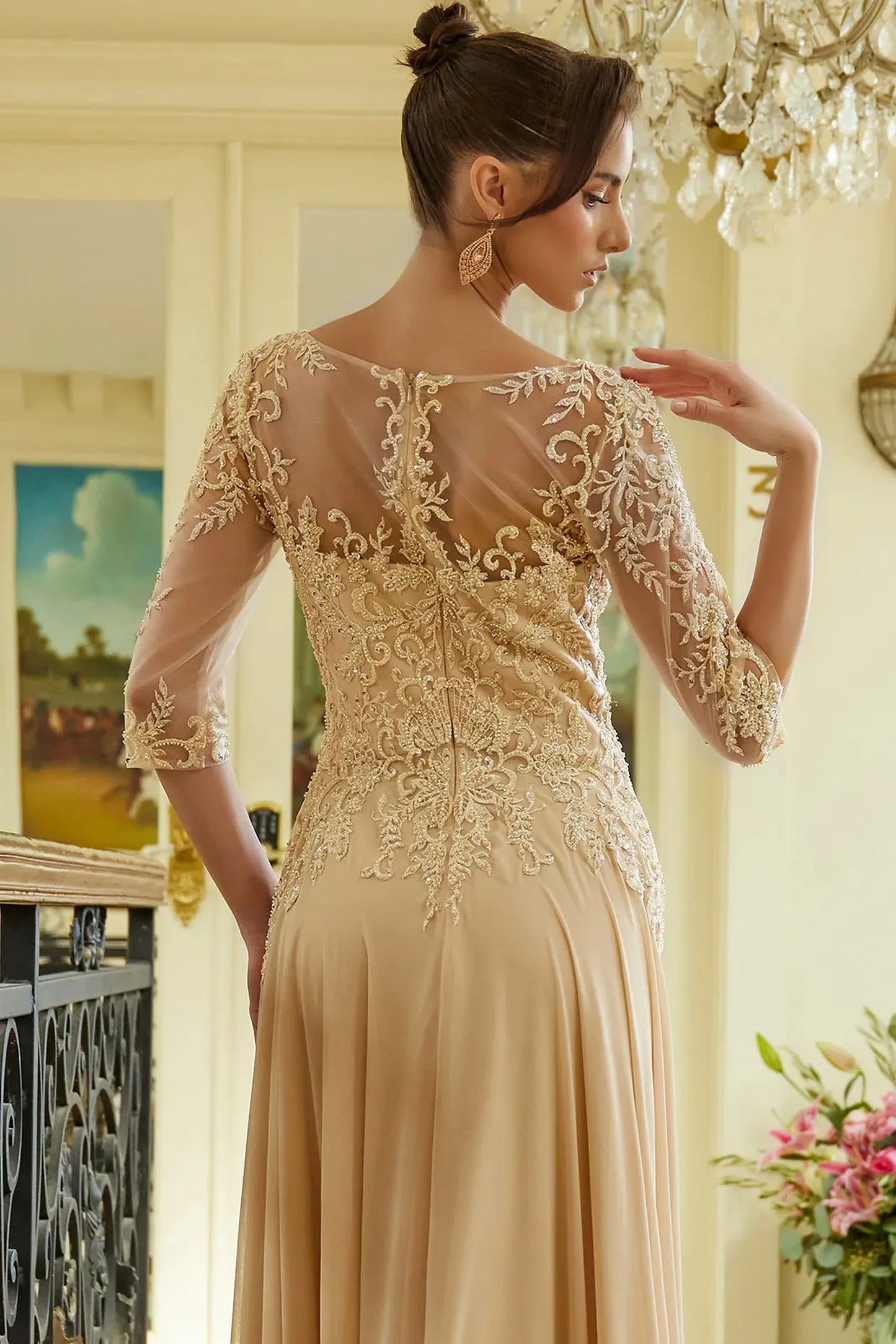 Champagne mother of the bride dress featuring concealed zipper back bodice finished with beads, embroidery, sequin