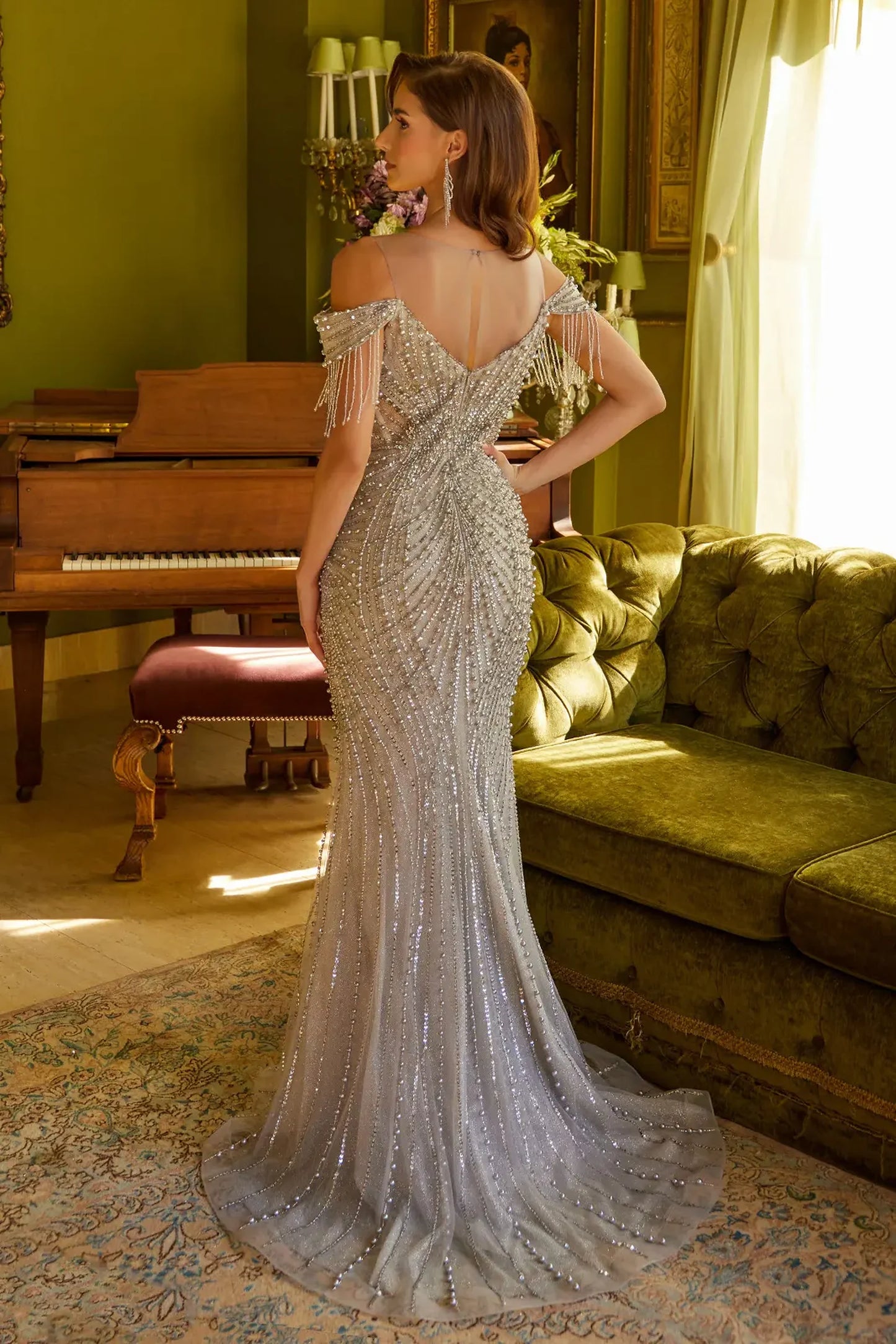 Silver fitted mother of the bride dress with concealed zipper back and cut-away shoulder