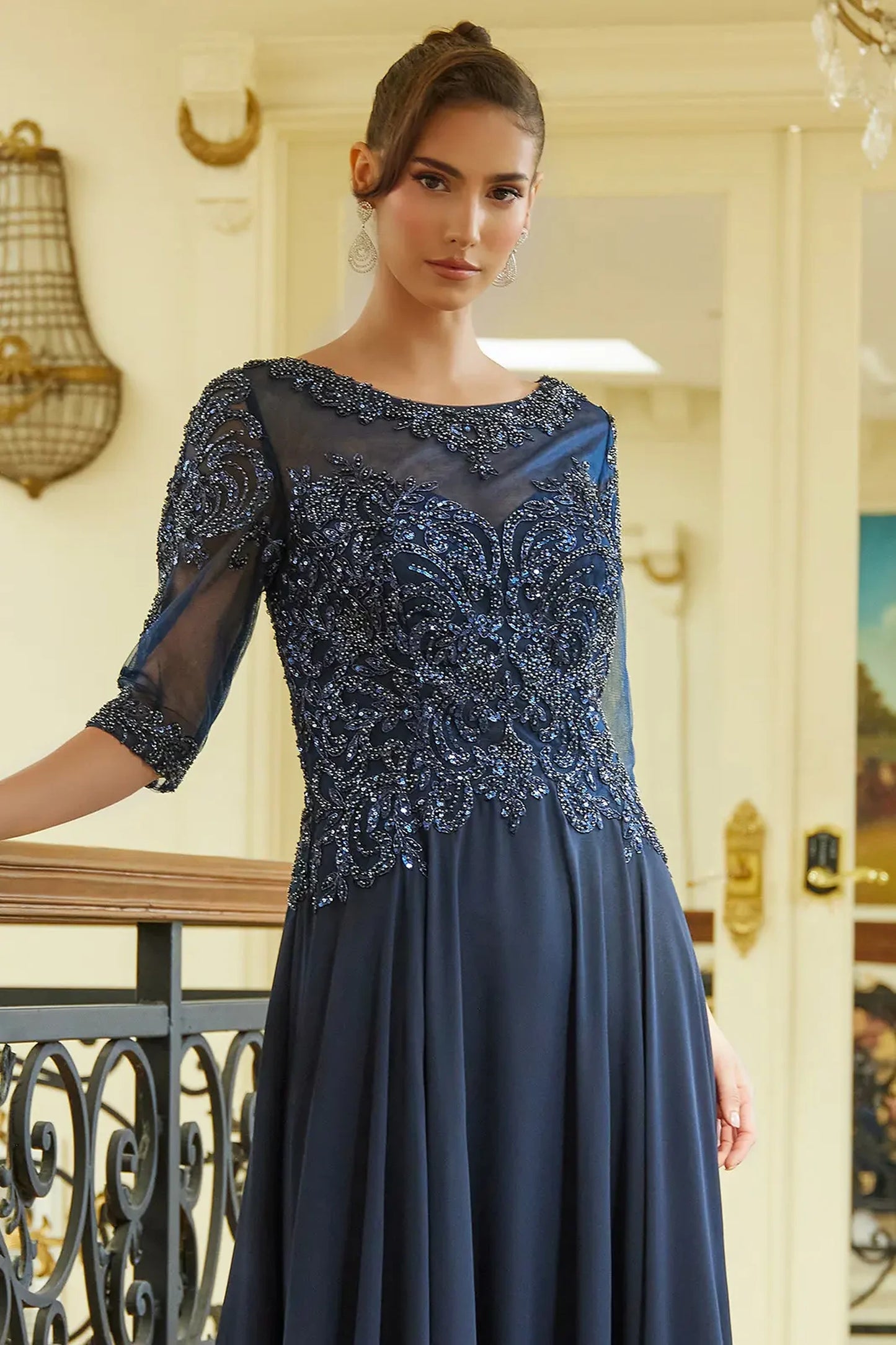 Navy mother of the bride dress featuring illusion sweetheart bodice with 1/2 sleeve and beads, sequin