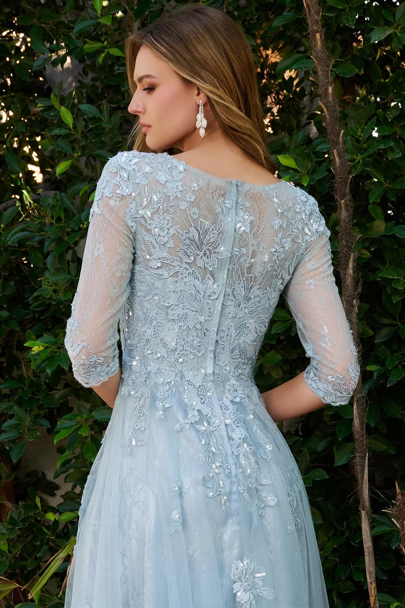 Smoky Blue mother of the bride dress featuring concealed zipper back bodice finished with embroidery, sequin
