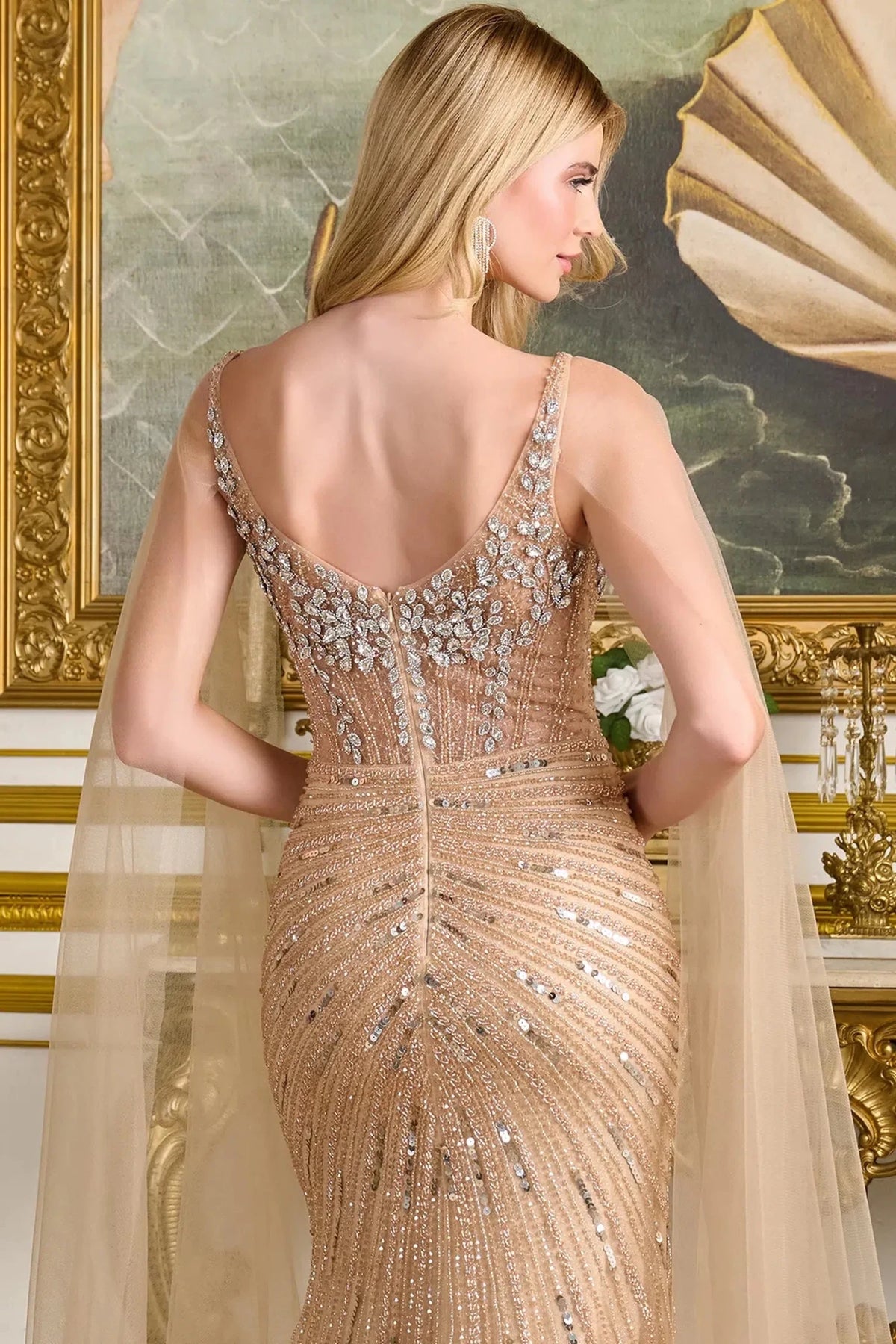 Champagne mother of the bride dress with a curved open back framed by jeweled straps