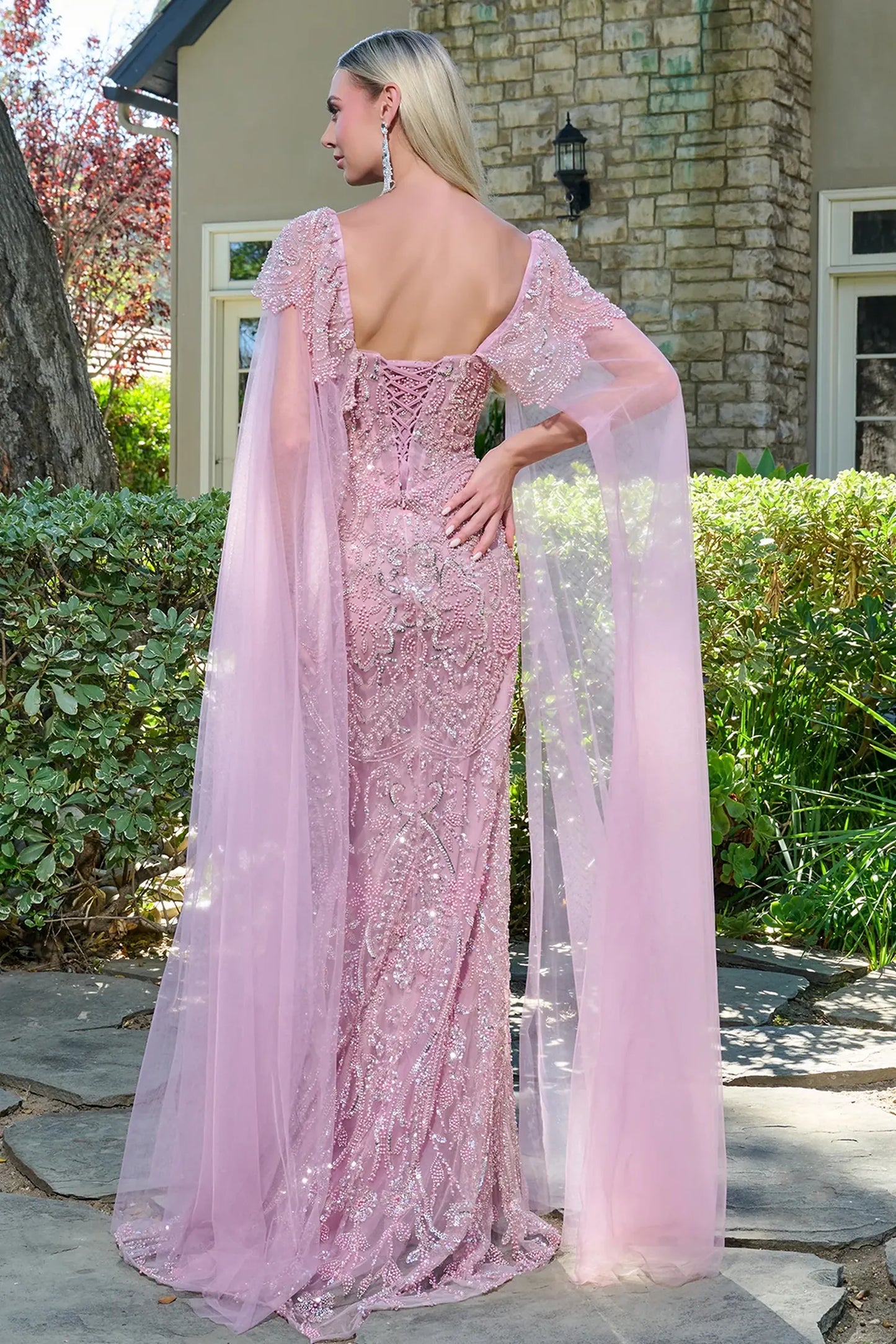 Dusty Rose fitted mother of the bride dress with corset back and cape sleeve