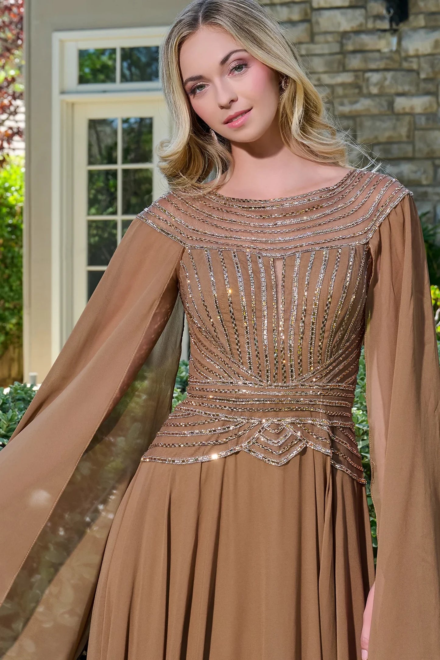 Chocolate Brown mother of the bride dress featuring scoop-neck bodice with cape sleeve and jewel