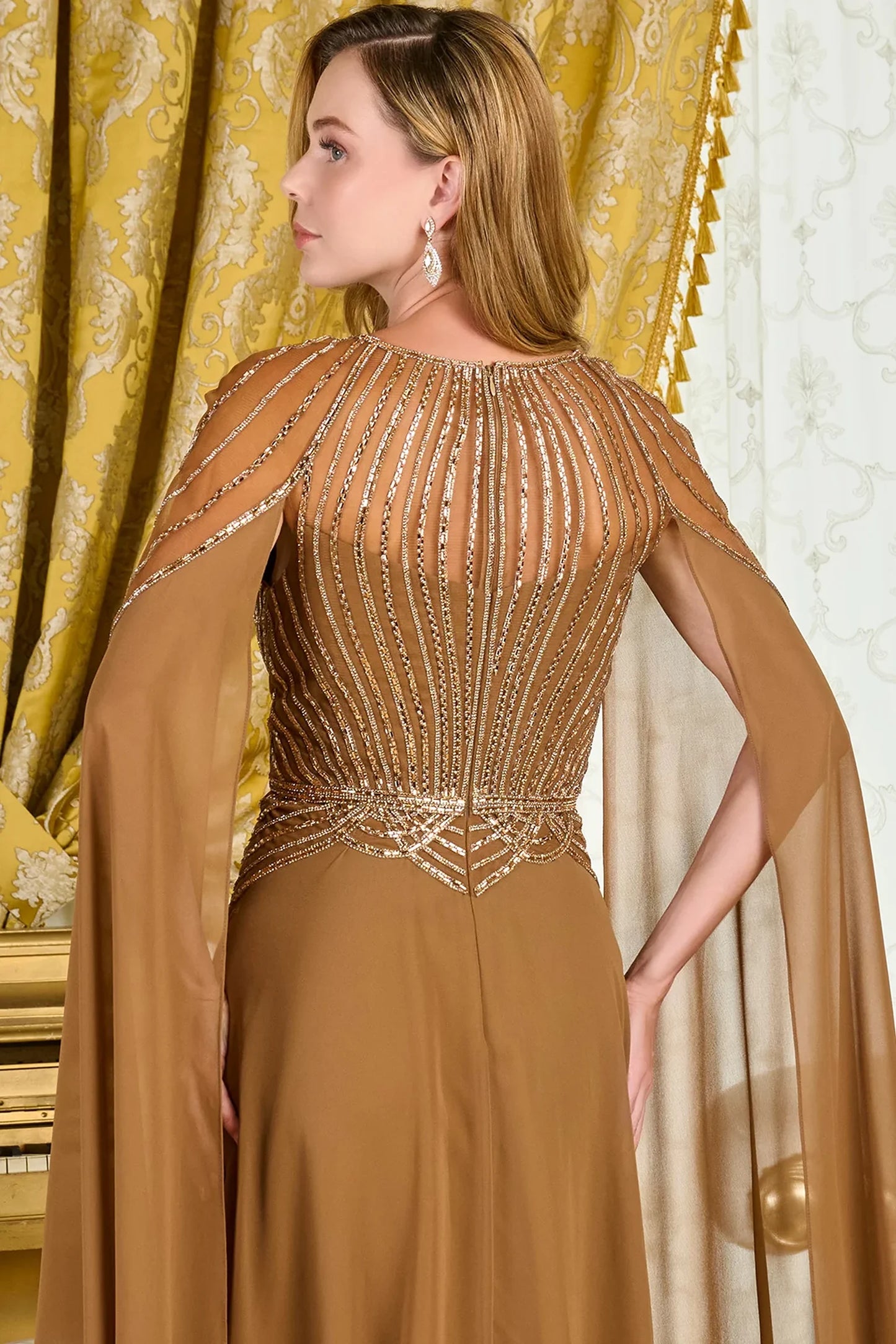 Light Brown mother of the bride dress featuring concealed zipper back bodice finished with jewel