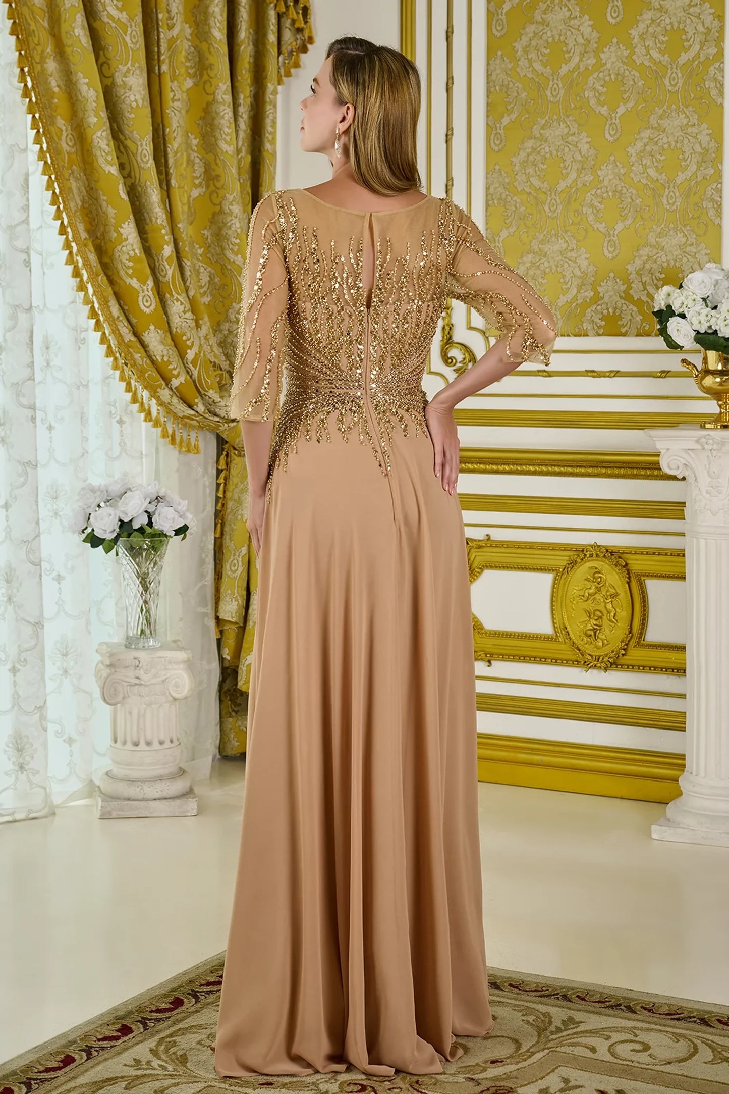 Gold a-line mother of the bride dress with concealed zipper back and 3/4 sleeve