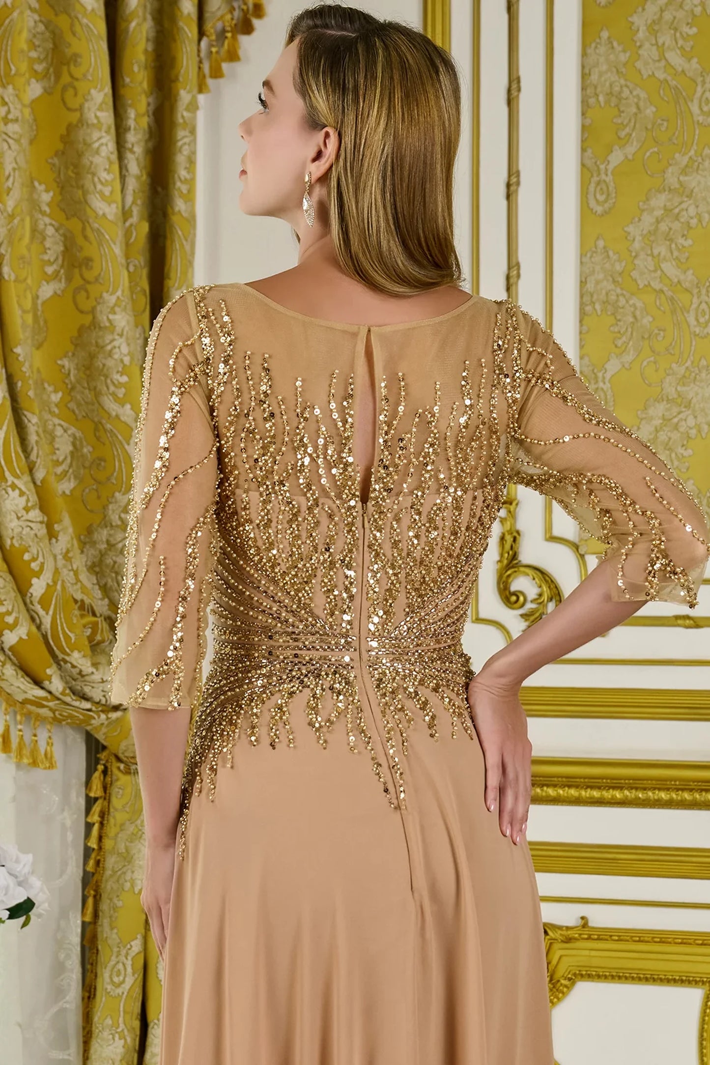Gold mother of the bride dress featuring concealed zipper back bodice finished with beads, jewel, sequin
