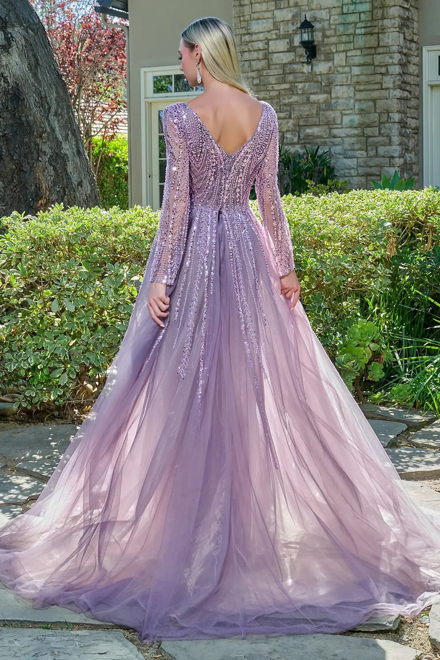 Mauve mother of the bride dress featuring formal gown with v-neck, long sleeve, and mesh skirt