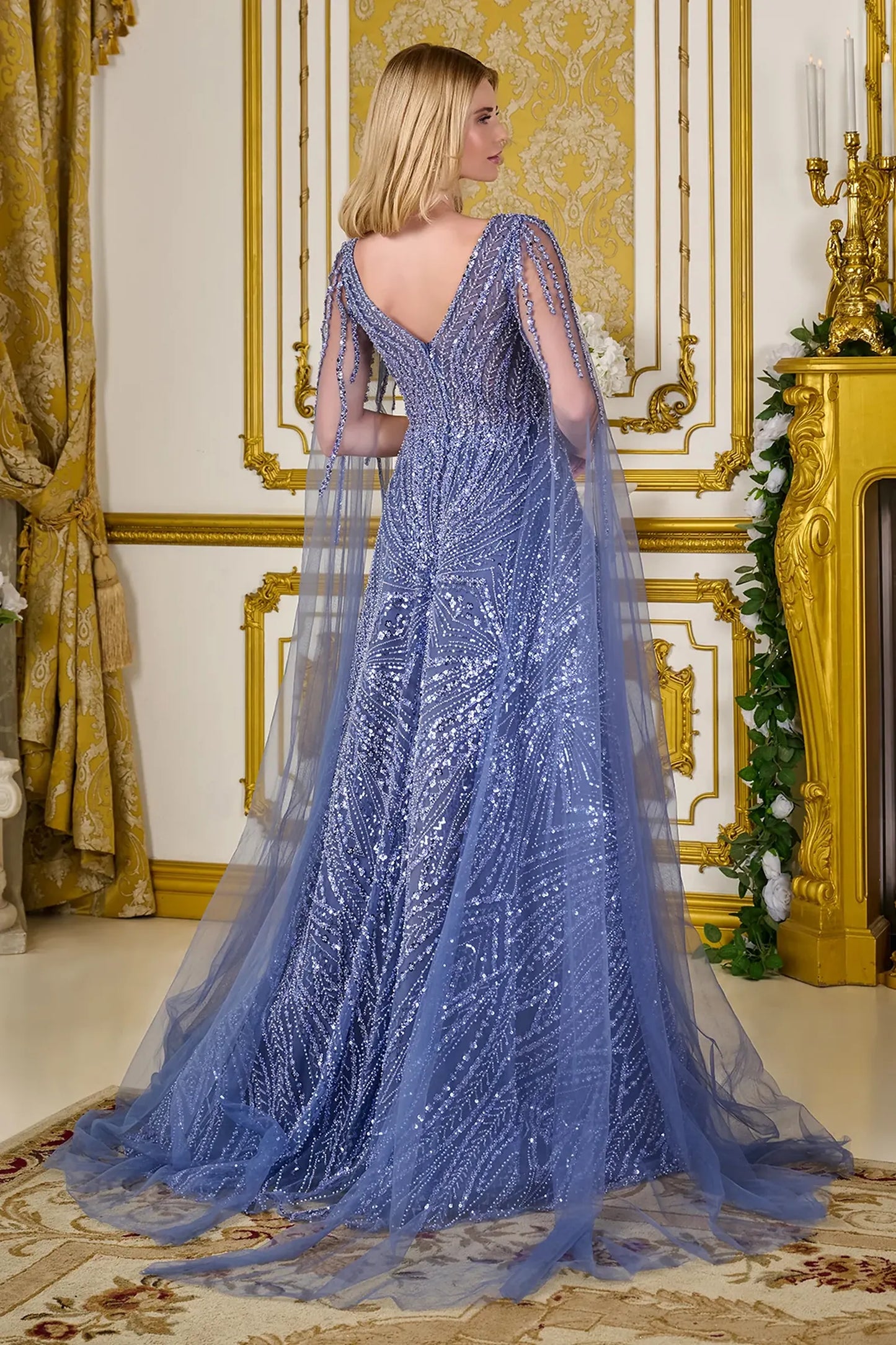 Smoky Blue mother of the bride dress featuring formal gown with v-neck, cape sleeve, and mesh skirt